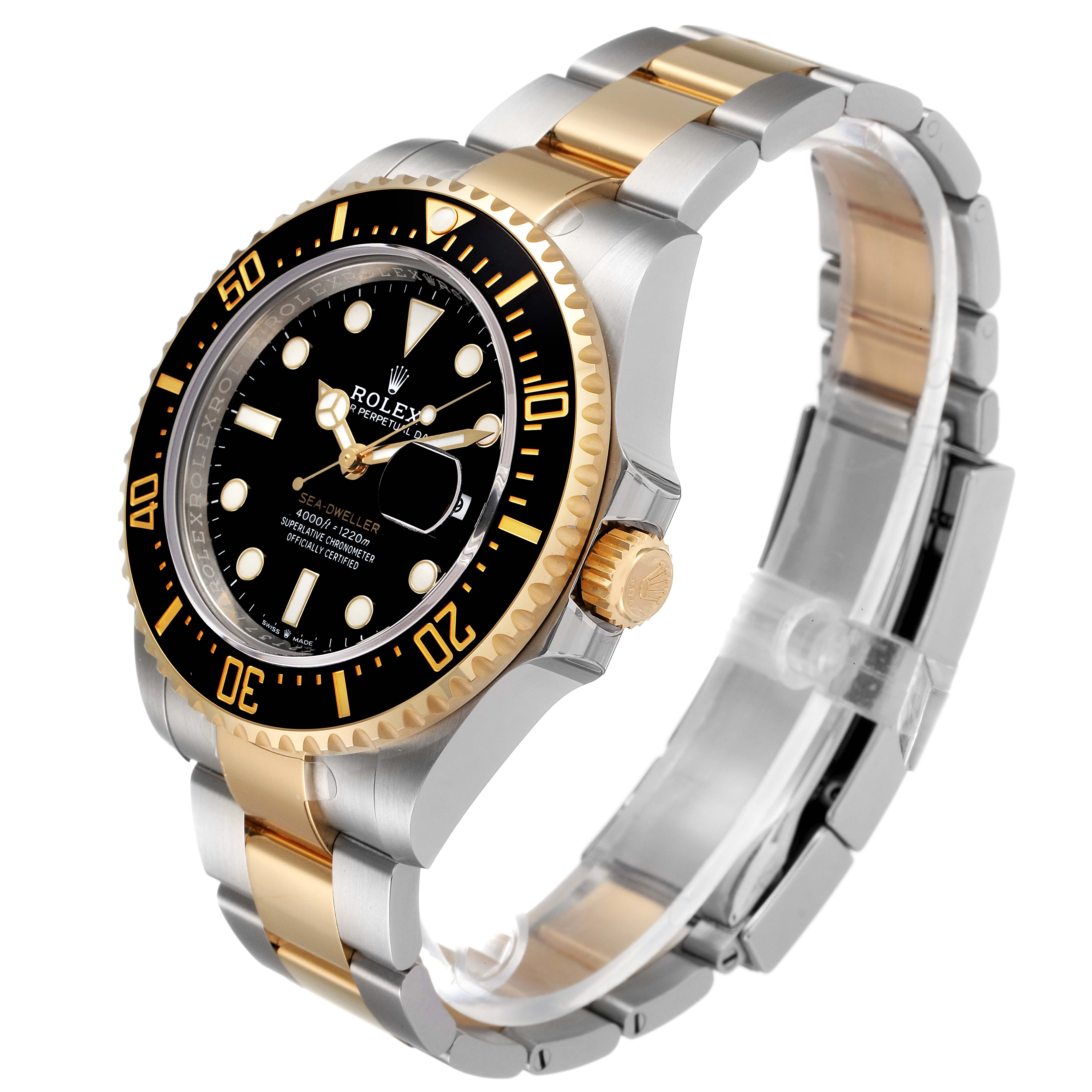 A side-angled view of the Rolex Sea-Dweller 126603 Men's Steel and Gold (two tone) Black Dial 126603 Men's Steel and Gold (two tone) Black Dial watch, showing its dial, bezel, crown, and bracelet.