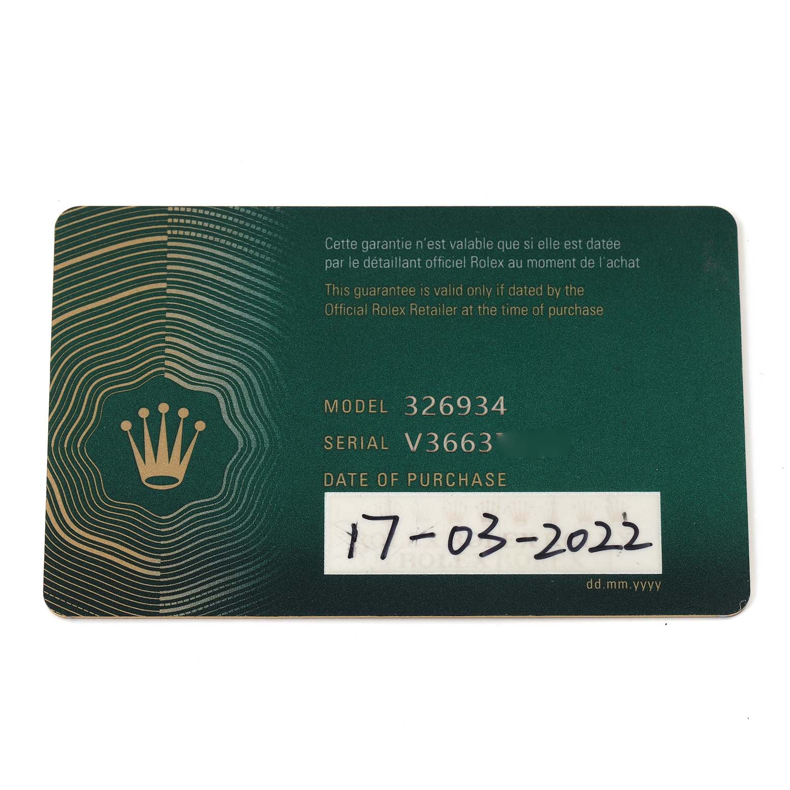 The image shows a warranty card for a Rolex Sky-Dweller model 326934 with the purchase date mentioned.