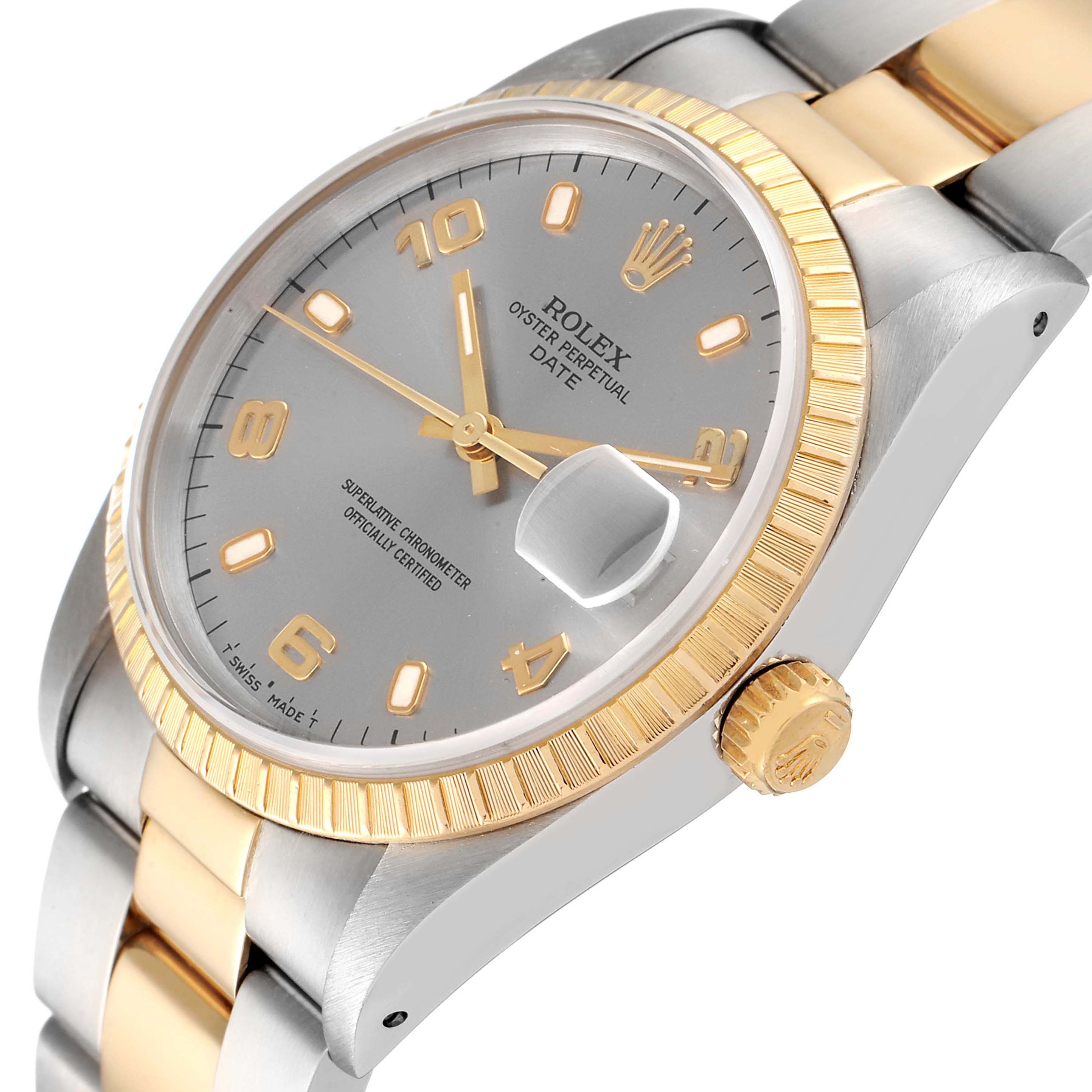 This image shows a Rolex Date 15223 Men's Steel and Gold (two tone) Grey Dial 15223 Men's Steel and Gold (two tone) Grey Dial model watch at a slight angle, highlighting the crown, bezel, dial, and part of the bracelet.