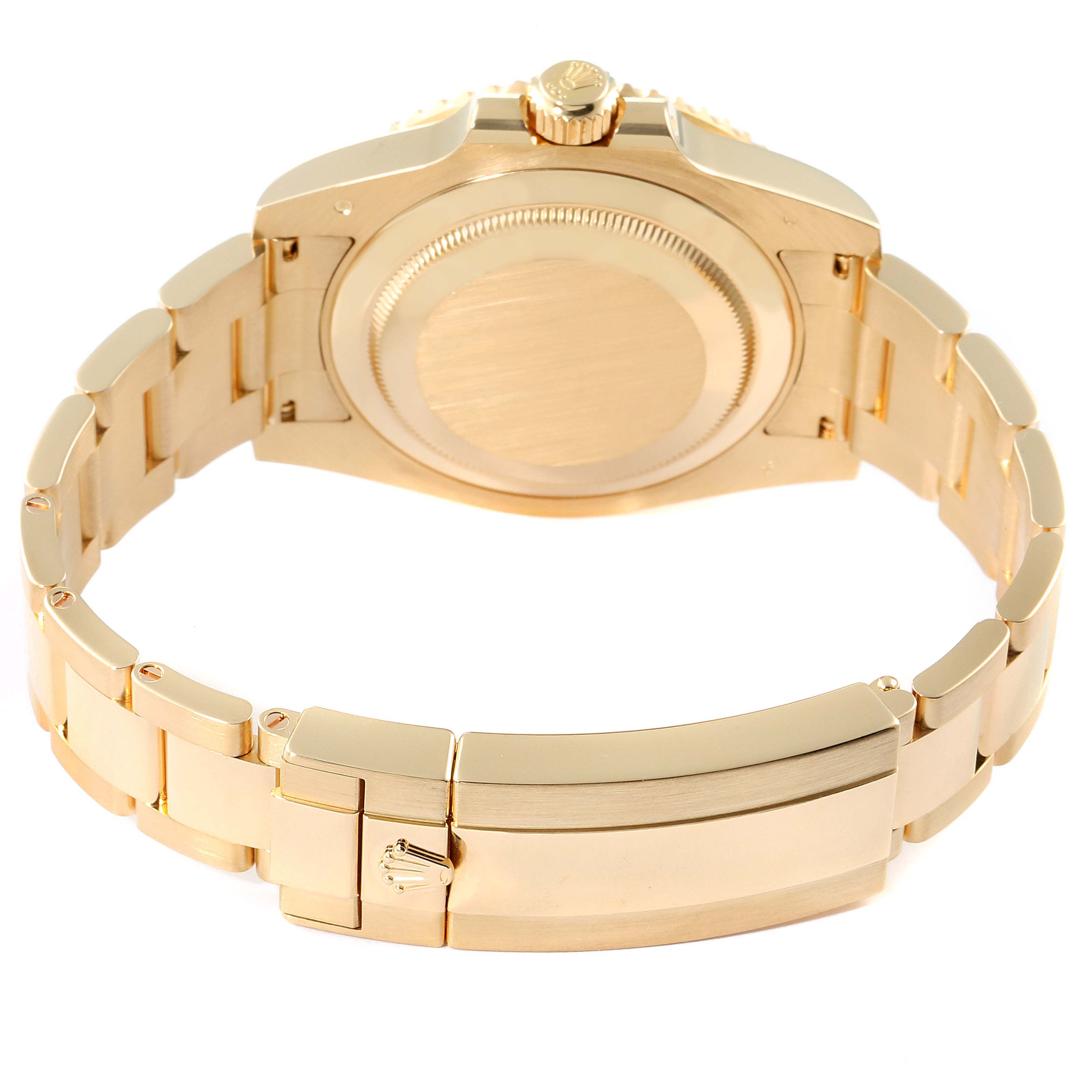 The image shows the rear angle of a Rolex Submariner 116618 Men's Yellow Gold Black Dial 116618 Men's Yellow Gold Black Dial watch, highlighting its gold case, bracelet, and clasp.