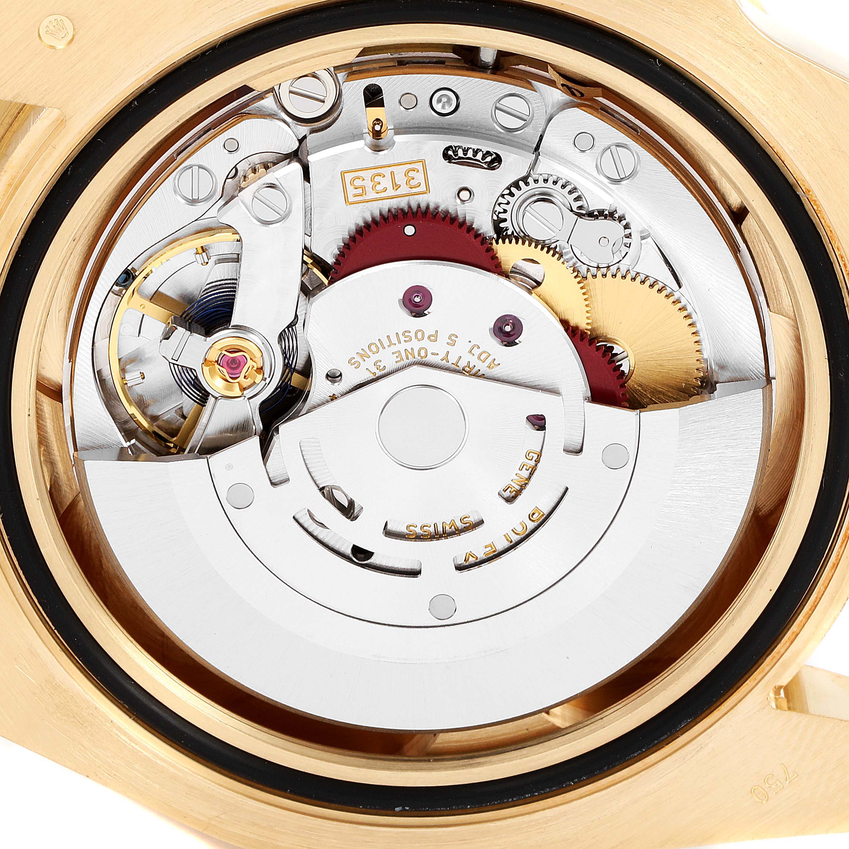 The image shows the intricate inside mechanism and movement of a Rolex Submariner 116618 Men's Yellow Gold Black Dial 116618 Men's Yellow Gold Black Dial watch from the back angle.