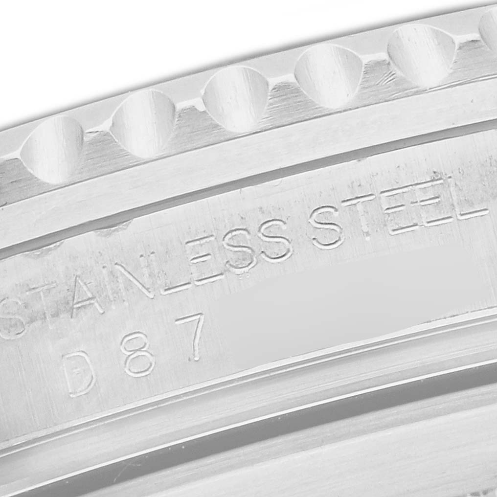 The image shows a close-up of the case back engraving on a Rolex Submariner 16610 Men's Stainless Steel Black Dial 16610 Men's Stainless Steel Black Dial, highlighting the stainless steel material.