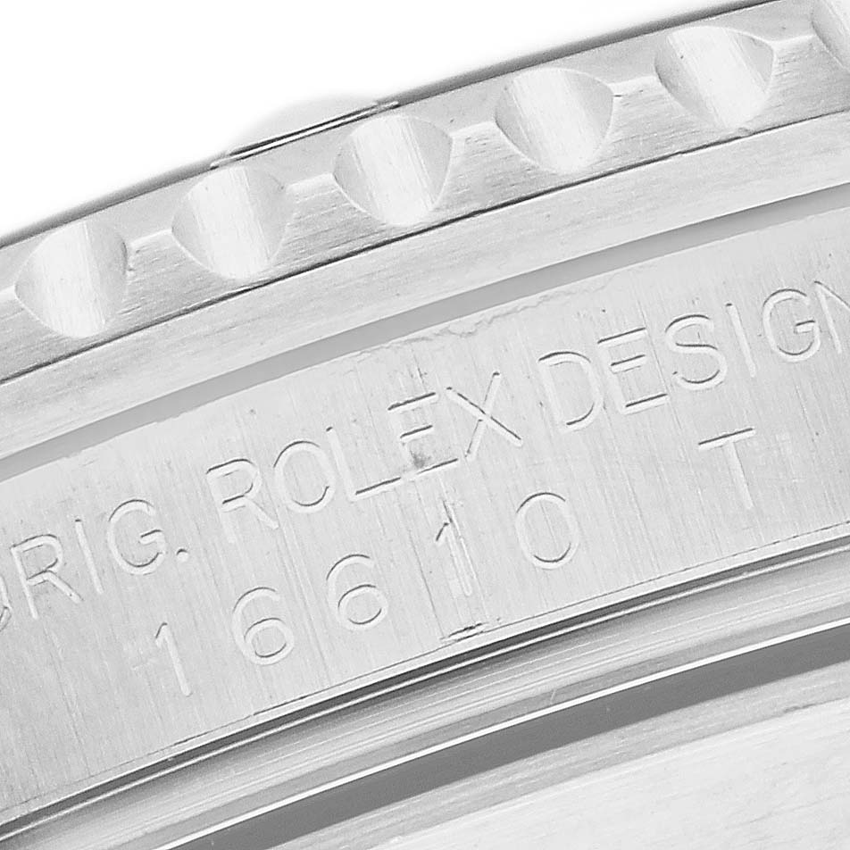This close-up image shows the case and reference number engraving of a Rolex Submariner 16610 Men's Stainless Steel Black Dial 16610 Men's Stainless Steel Black Dial watch.