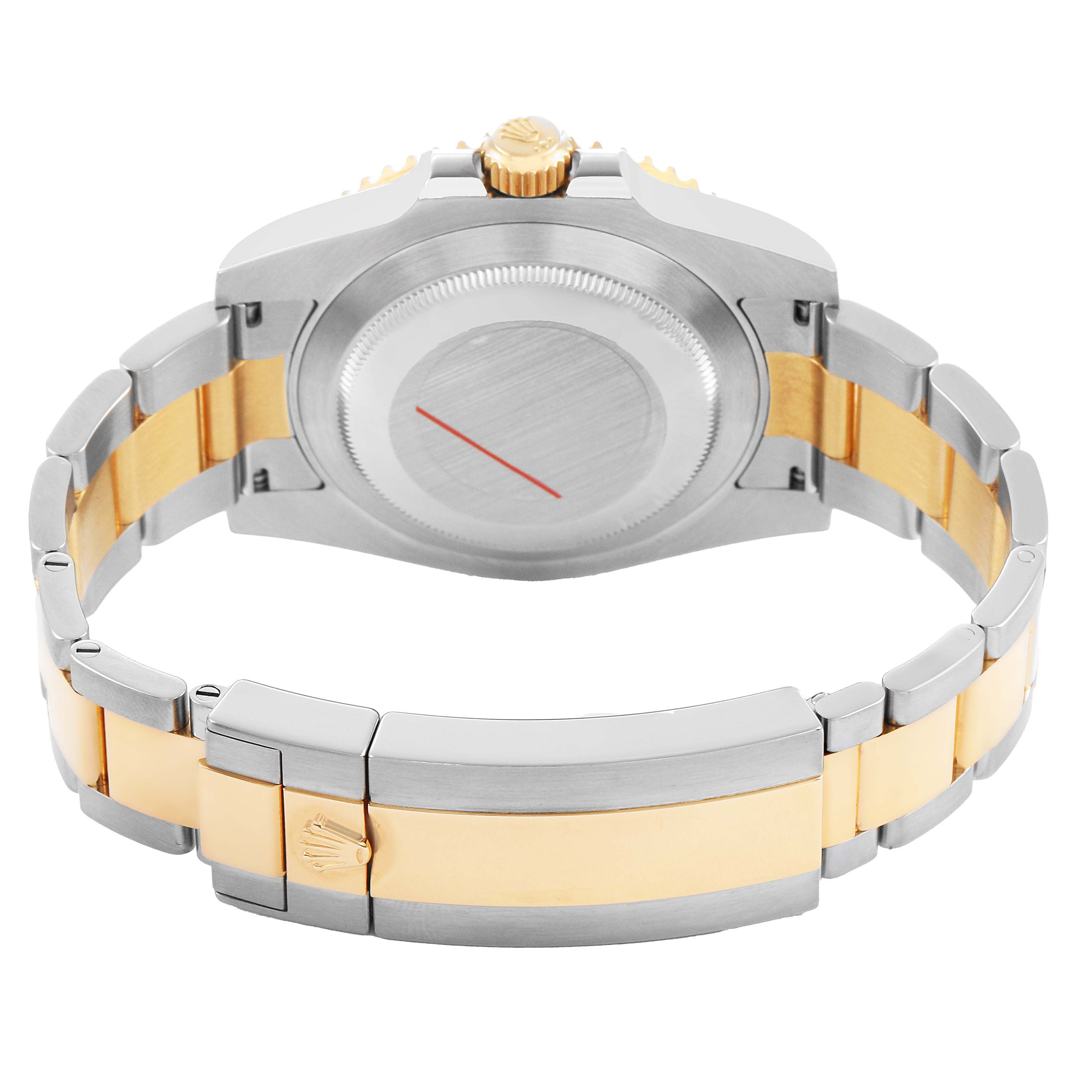 The image shows the back and bracelet of a Rolex Submariner 116613 Men's Steel and Gold (two tone) Black Dial watch, highlighting the case back, crown, and two-tone strap.