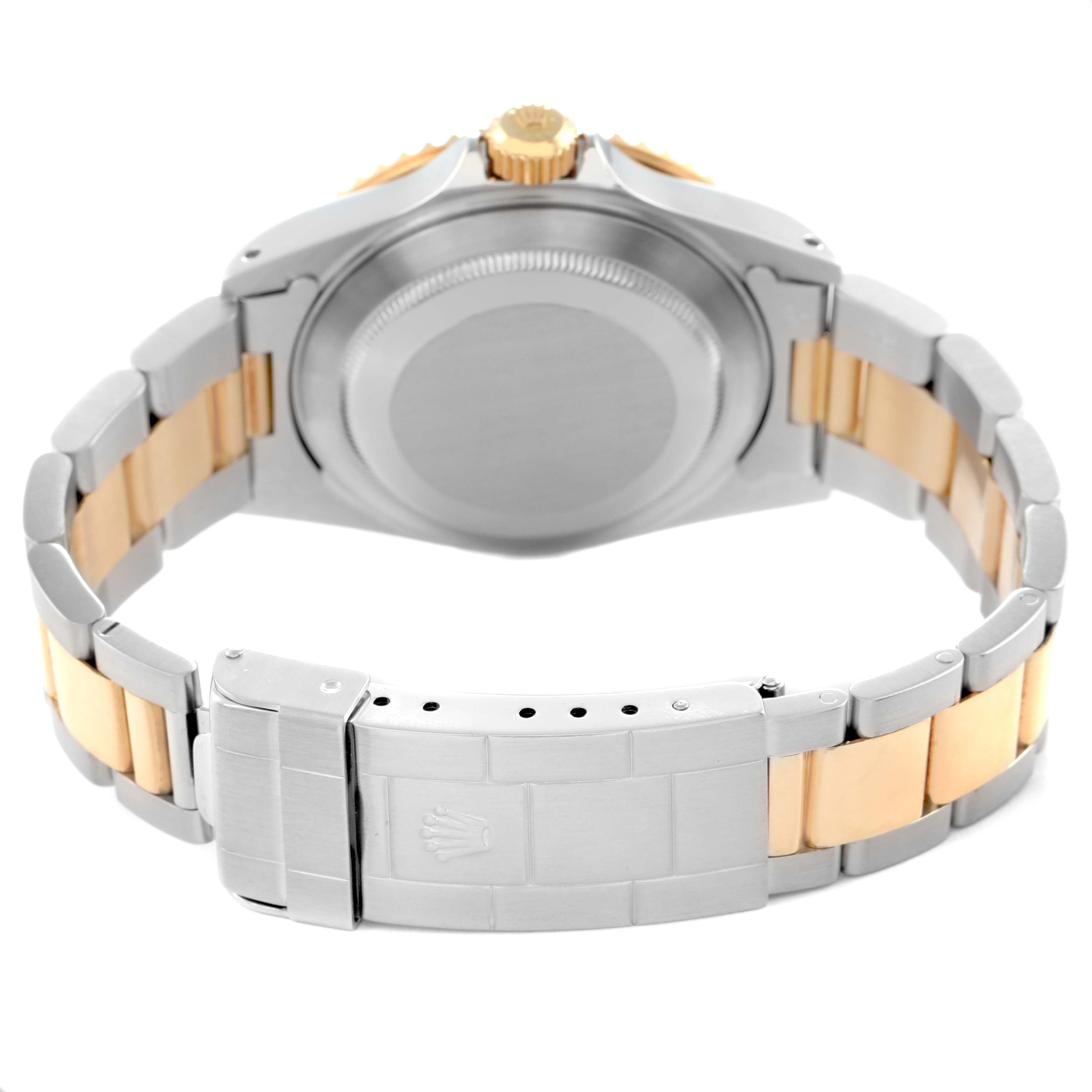 The image shows the back view of a Rolex Submariner model 16613, highlighting its case back, clasp, and bicolor bracelet.