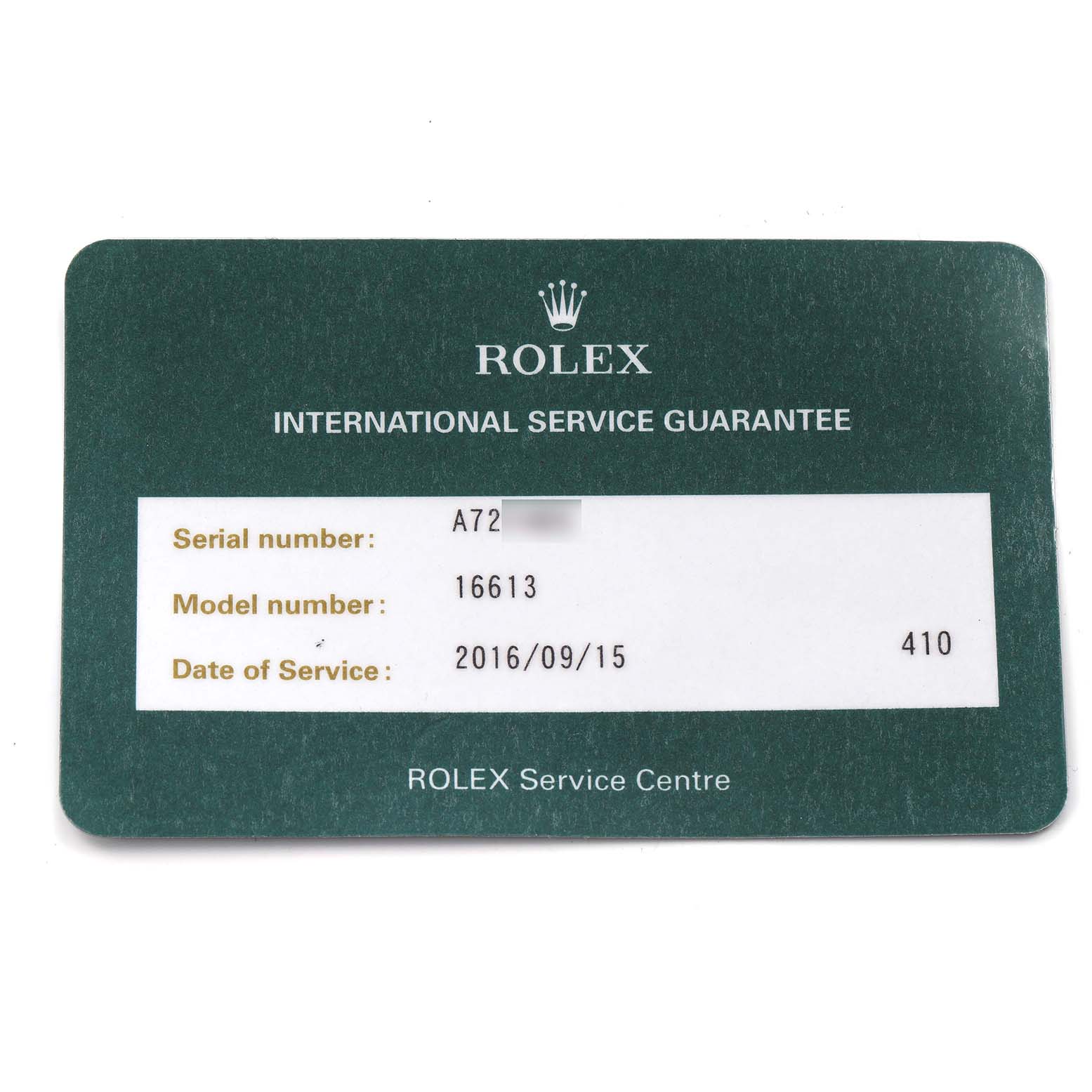 This image shows a Rolex service guarantee card, detailing the Submariner model 16613, including a serial number and service date.