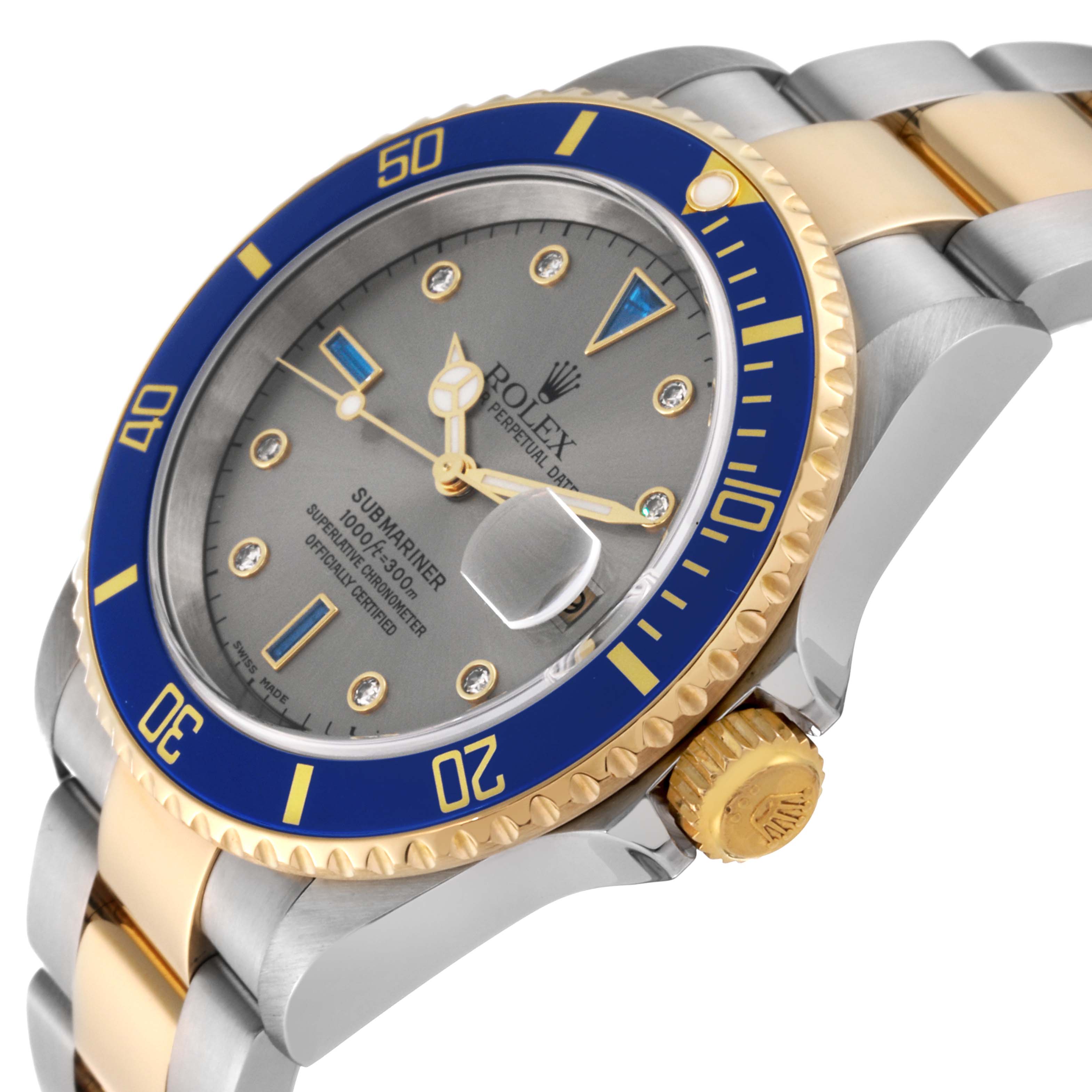 The image shows a close-up angled view of the Rolex Submariner 16613 Men's Steel and Gold (two tone) Grey Dial 16613 Men's Steel and Gold (two tone) Grey Dial watch, highlighting its dial, bezel, crown, and part of the bracelet.