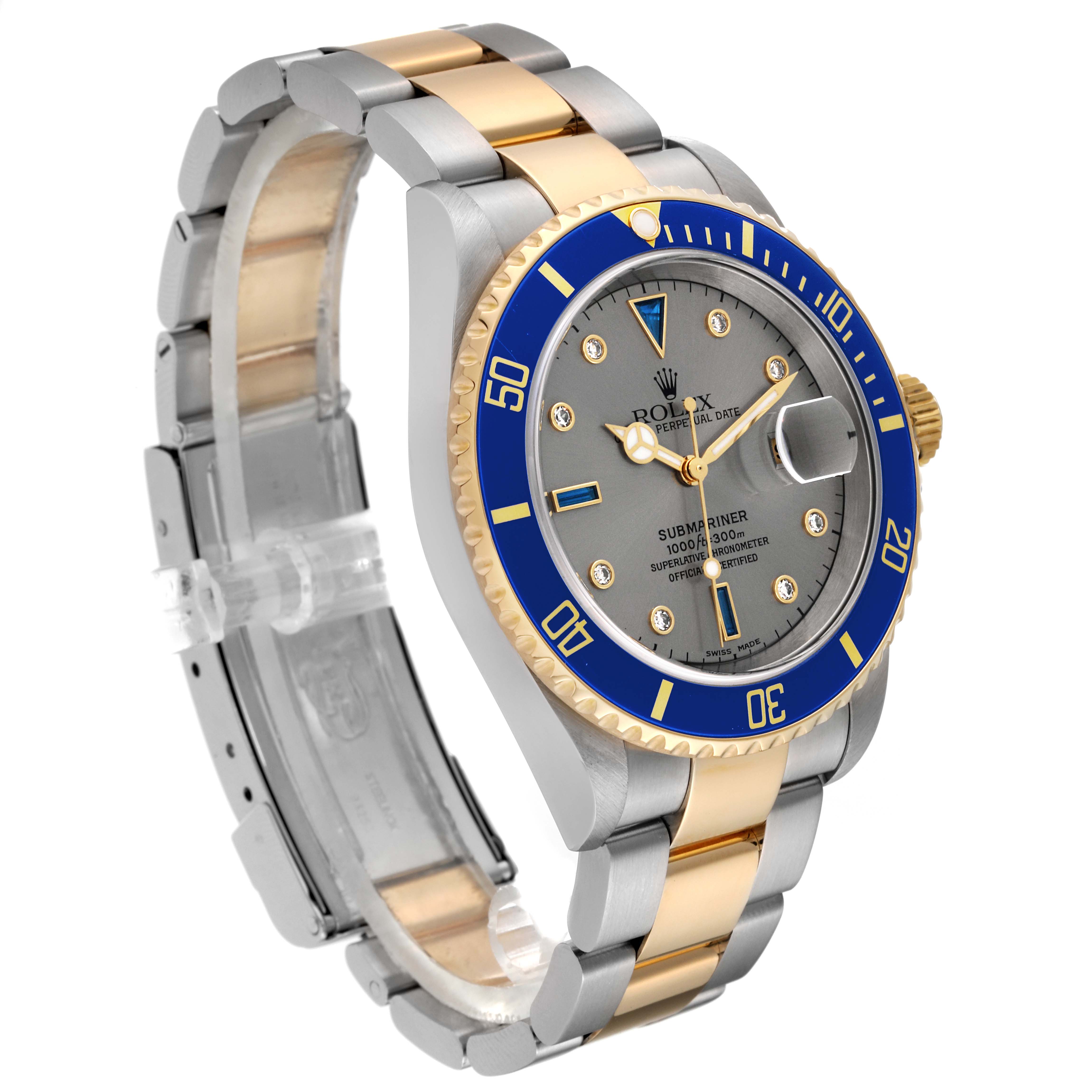 The image shows a side and front angle of a Rolex Submariner 16613 Men's Steel and Gold (two tone) Grey Dial 16613 Men's Steel and Gold (two tone) Grey Dial, displaying the face, bezel, and bracelet.