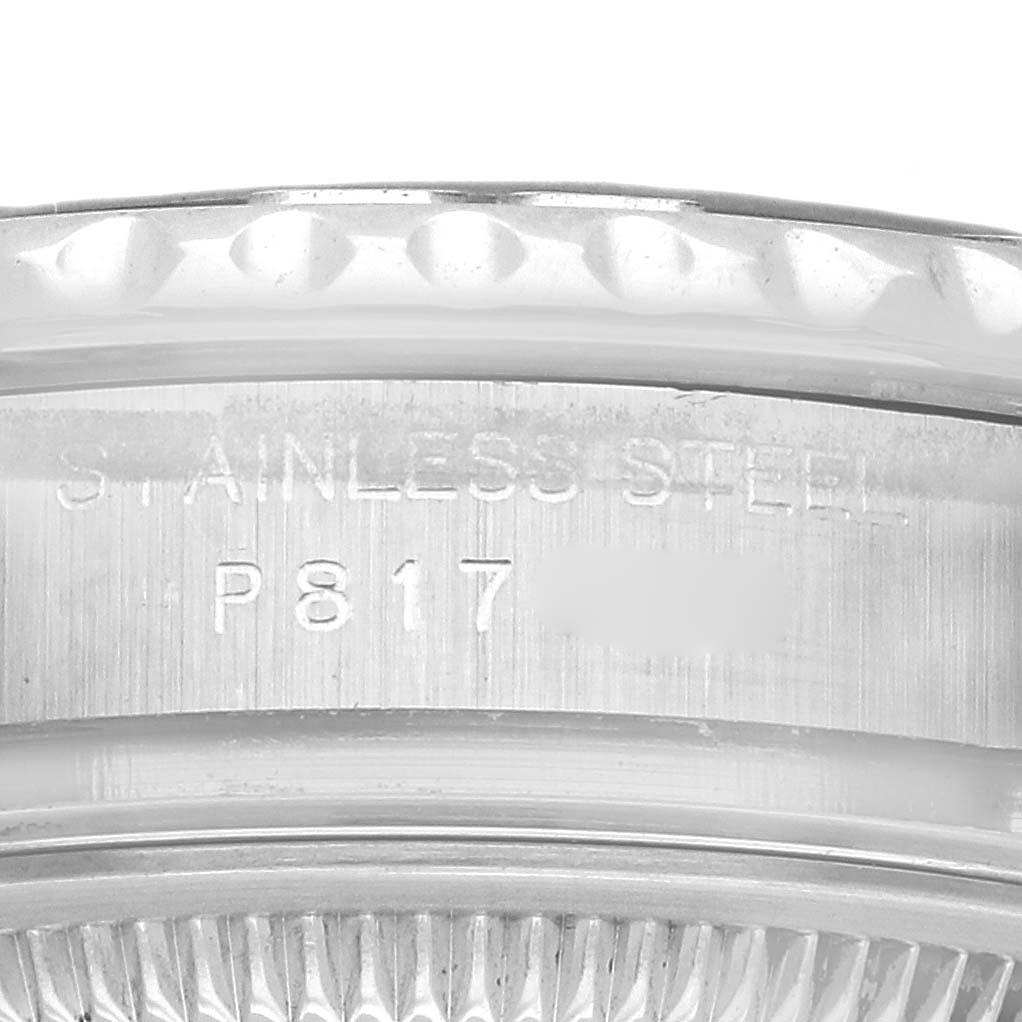 The image shows a close-up of the side of a Rolex Yacht-Master model 169622 watch, highlighting the stainless steel part with engraved text.