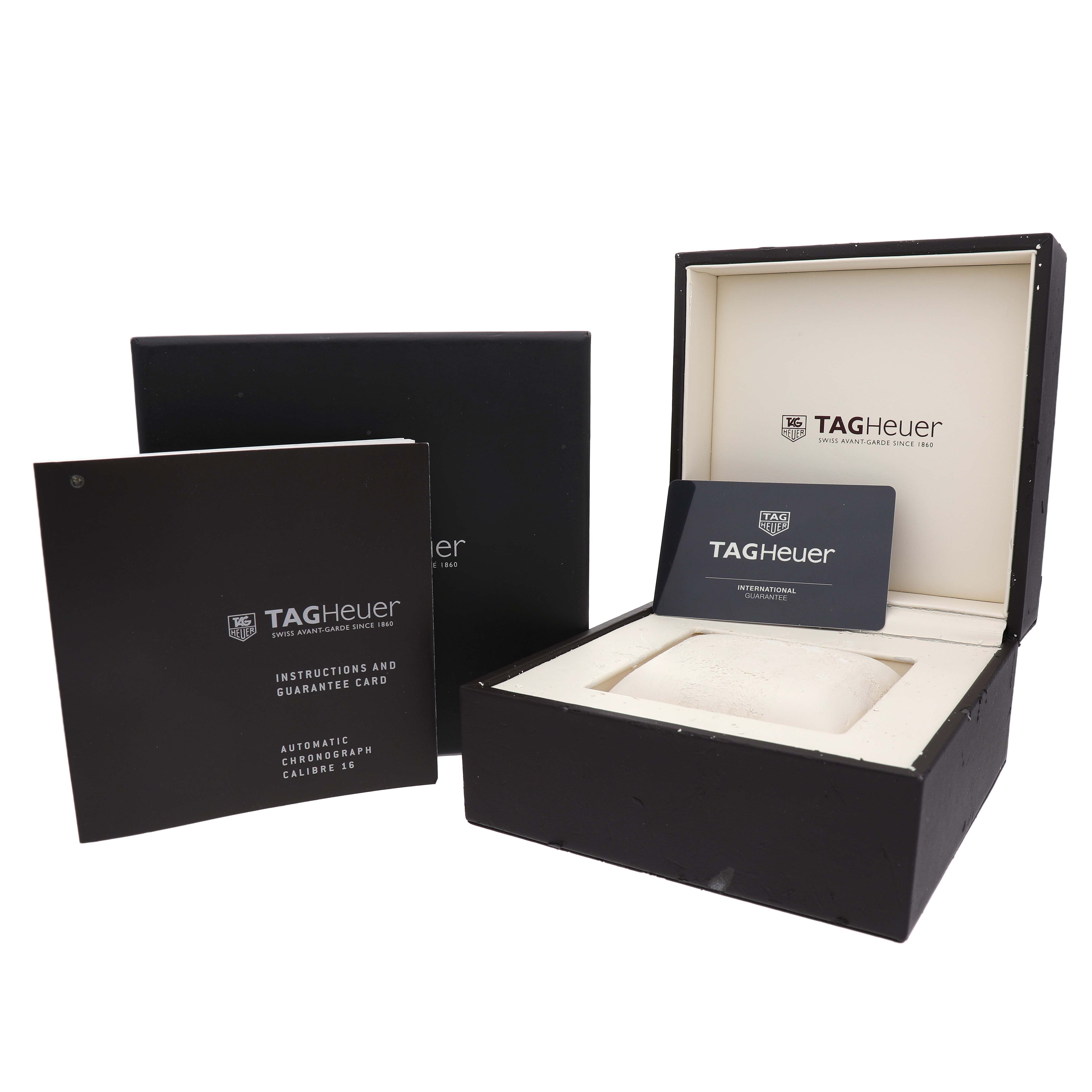 The image shows the Tag Heuer Aquaracer CAY2112.BA0927 Men's Stainless Steel Blue Dial watch box, warranty card, and instruction booklet from a frontal angle.