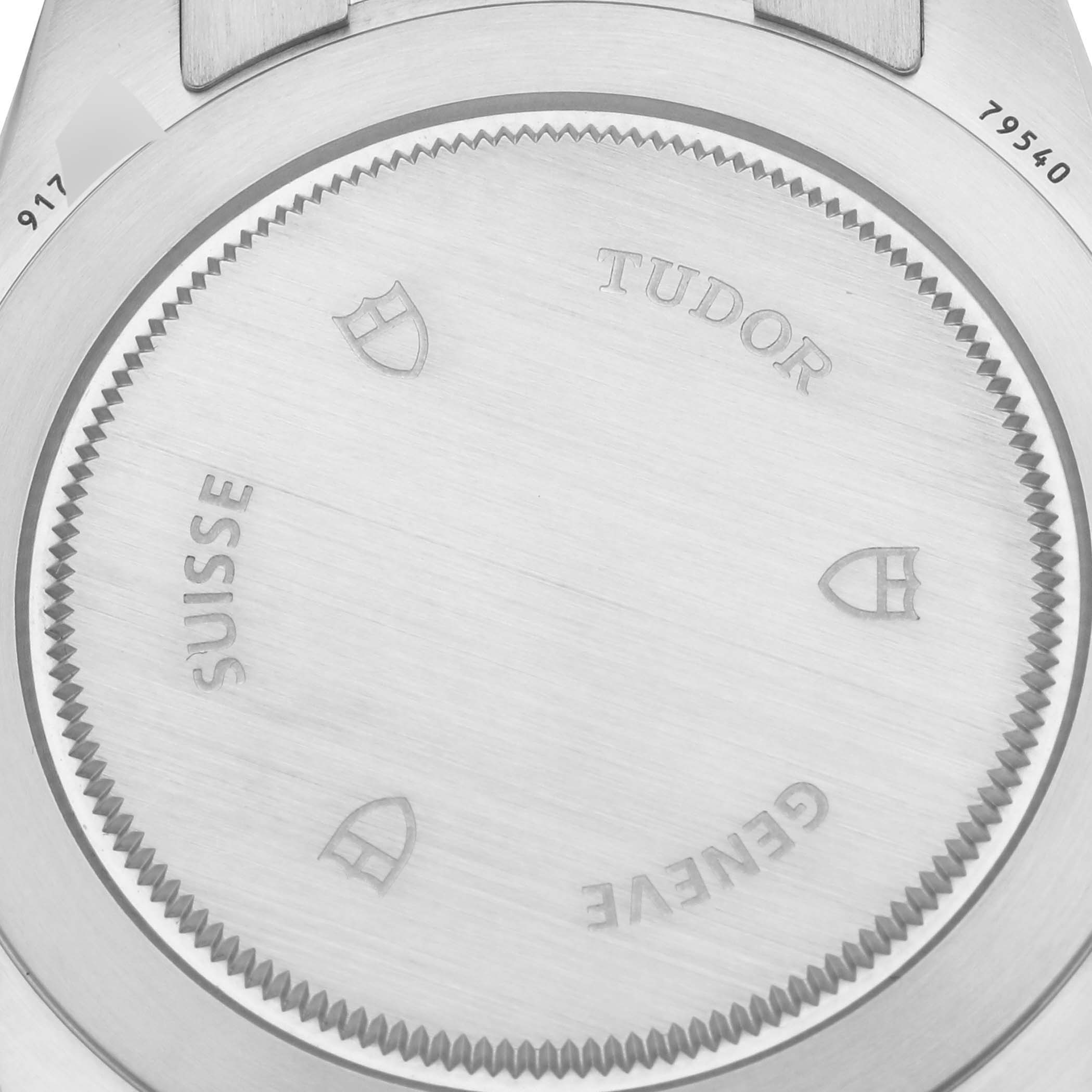 This image shows the case back of the Tudor Heritage Black Bay 79540 Men's Stainless Steel Black Dial 79540 Men's Stainless Steel Black Dial watch with engravings visible.