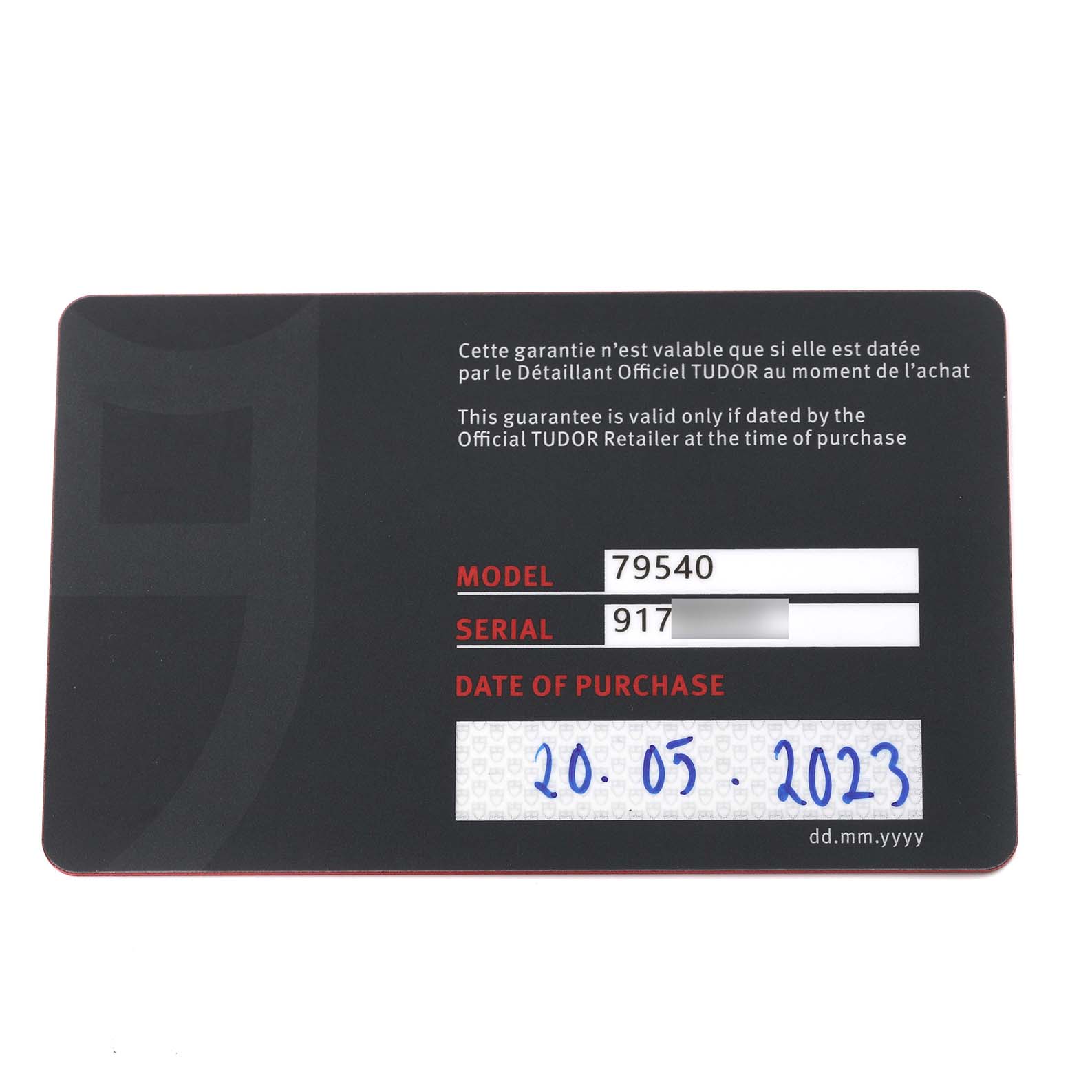 The image shows a warranty card for a Tudor Heritage Black Bay 79540 Men's Stainless Steel Black Dial 79540 Men's Stainless Steel Black Dial watch, displaying the model number, serial number, and date of purchase.