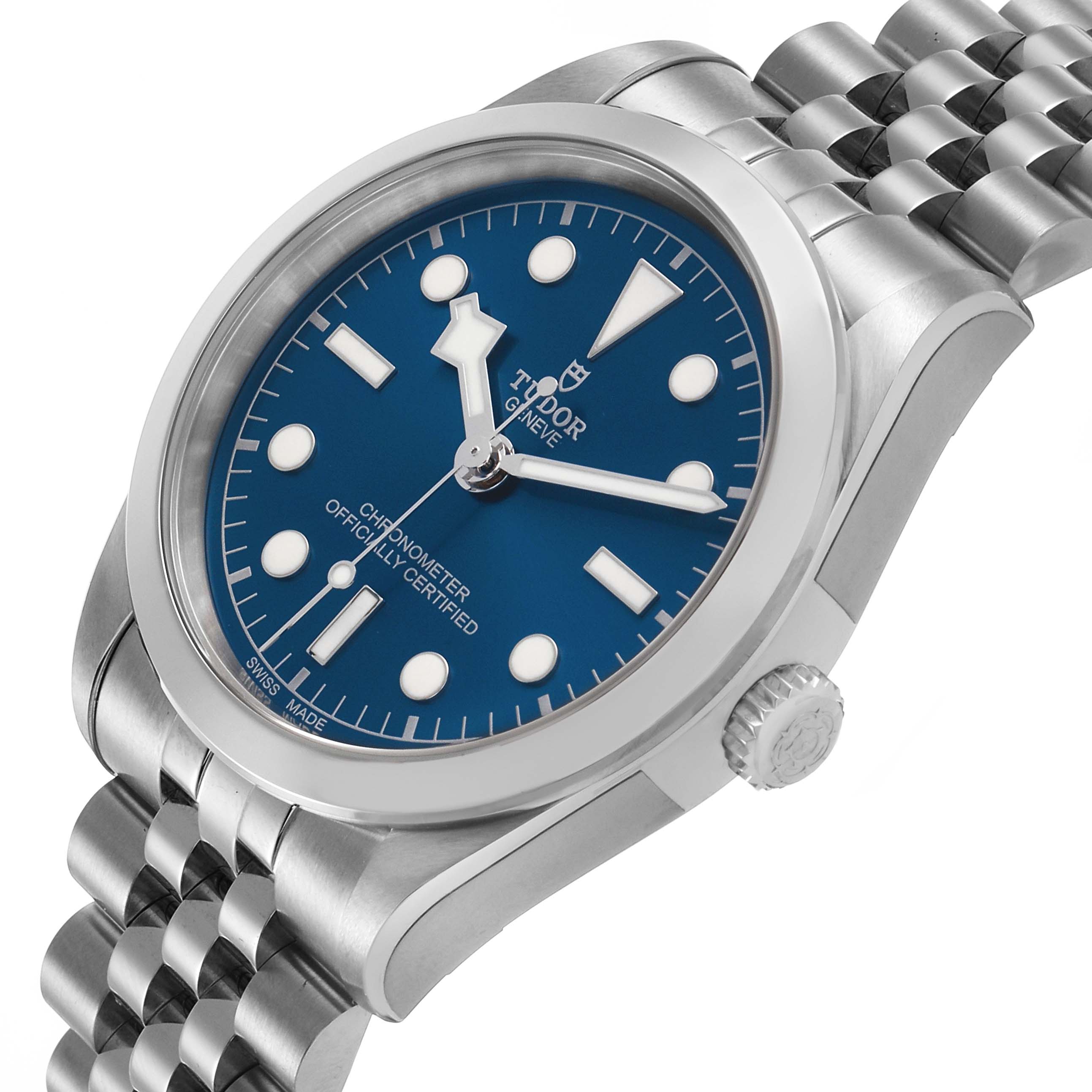 The Tudor Heritage Black Bay 79640 Men's Stainless Steel Blue Dial watch is shown at an angled side view, displaying its blue dial, case, crown, and metal bracelet.