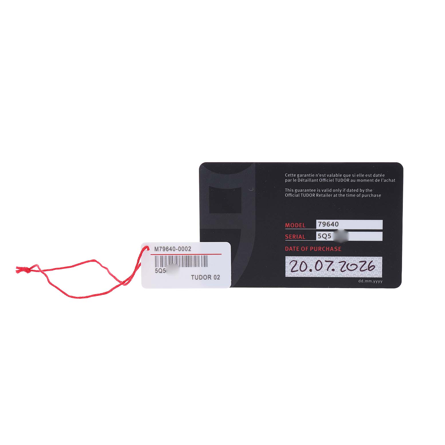 The image shows a Tudor Heritage Black Bay 79640 Men's Stainless Steel Blue Dial warranty card with model details, alongside a red string tag.