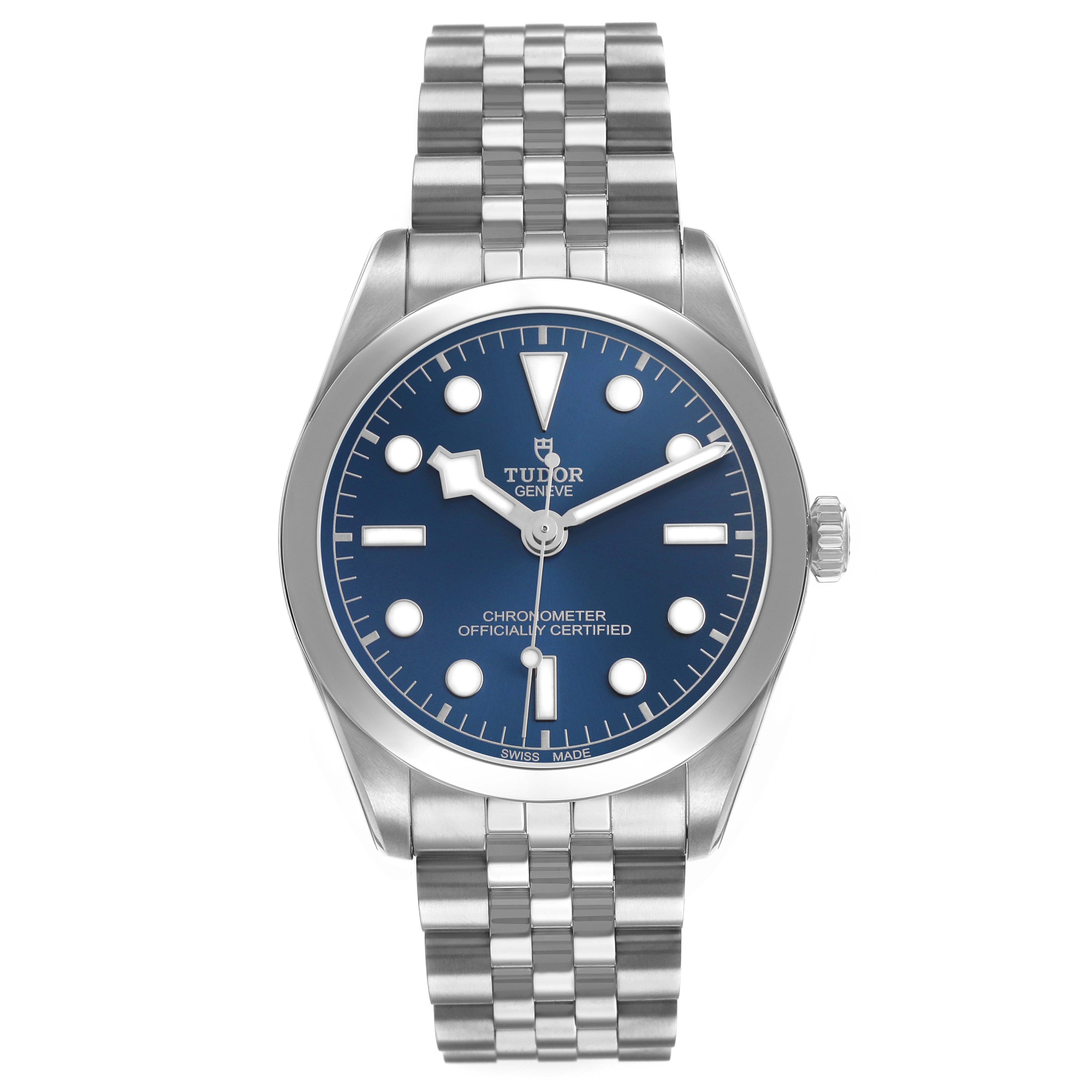 The Tudor Heritage Black Bay 79640 Men's Stainless Steel Blue Dial watch is shown from a front view, displaying its blue dial, hour markers, hands, and metal bracelet.
