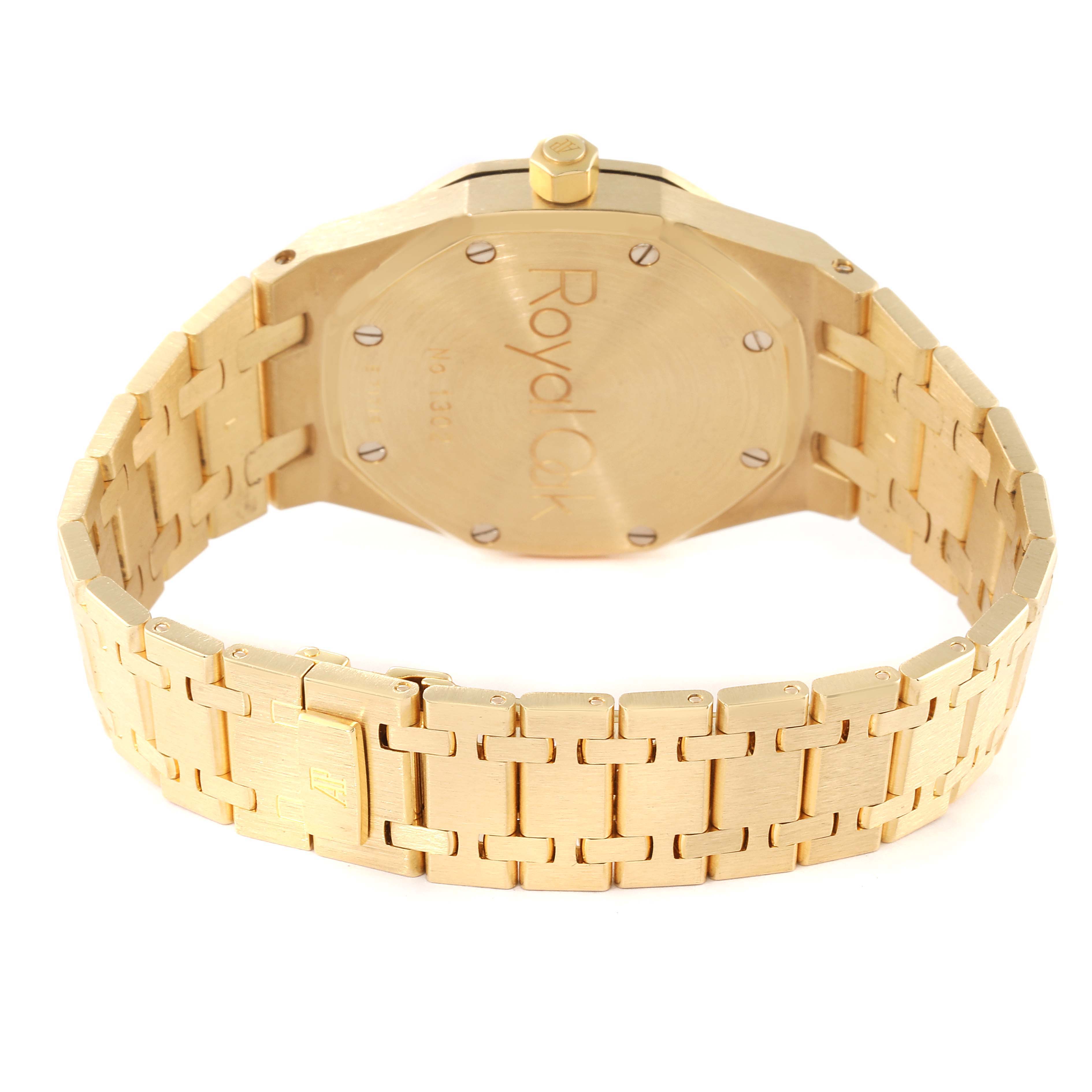 This image shows the gold back case and bracelet of an Audemars Piguet Royal Oak 14790BA Men's Yellow Gold Silver Dial 14790BA Men's Yellow Gold Silver Dial watch from an angled back view.