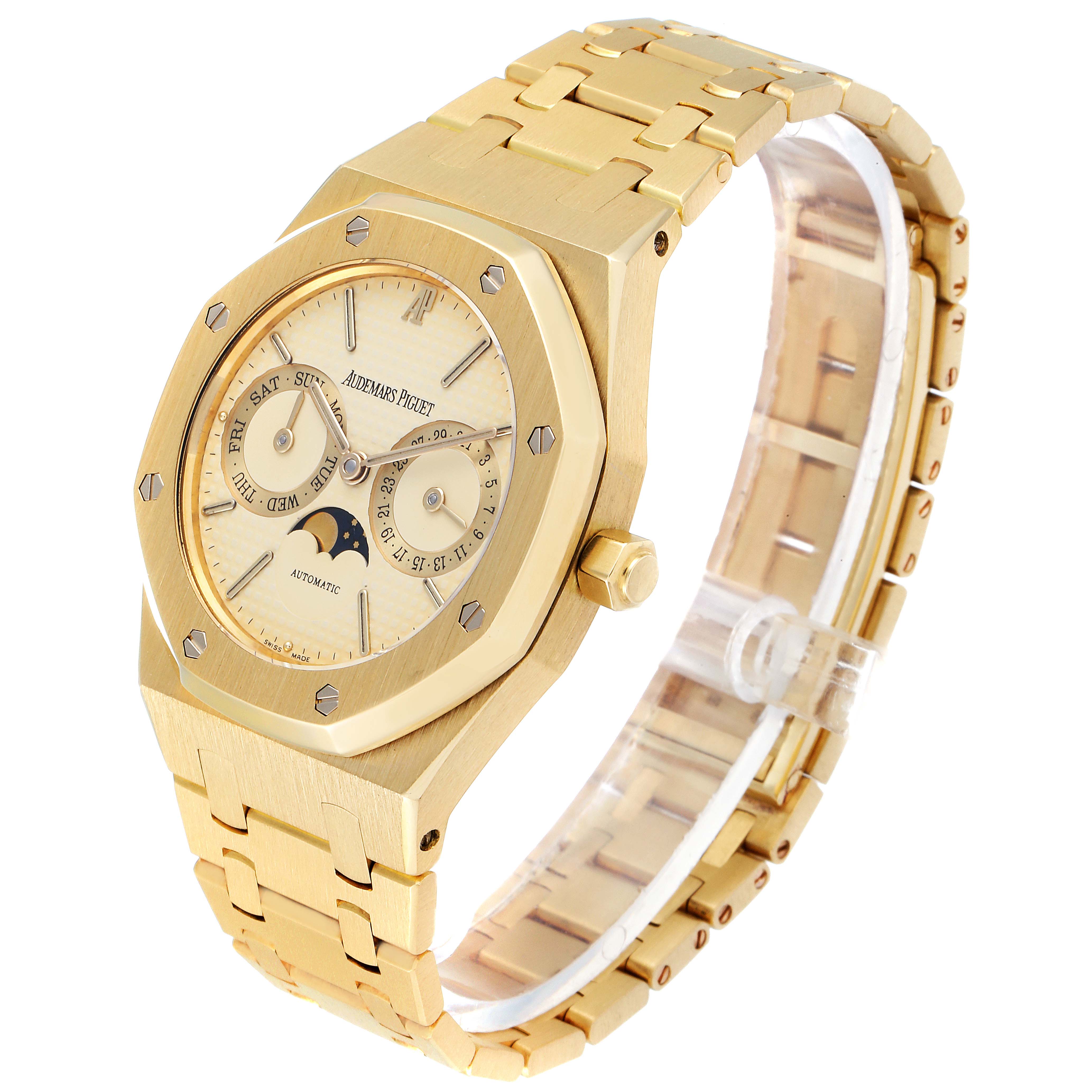 This image shows a Royal Oak model watch by Audemars Piguet at a front angle, displaying the face, gold bracelet, and side crown.