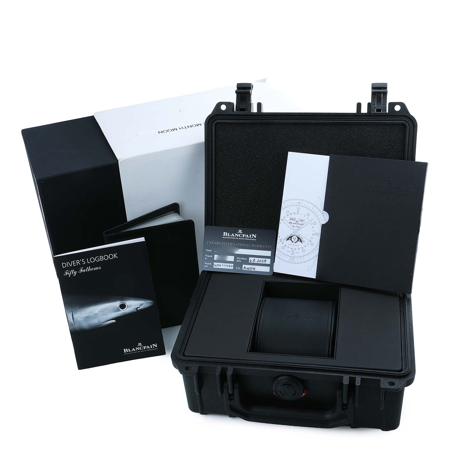 The image shows the Blancpain Fifty Fathoms 5054 1110 B52A Men's Stainless Steel Grey Dial watch packaging, including a case, diver's logbook, warranty card, and documentation.