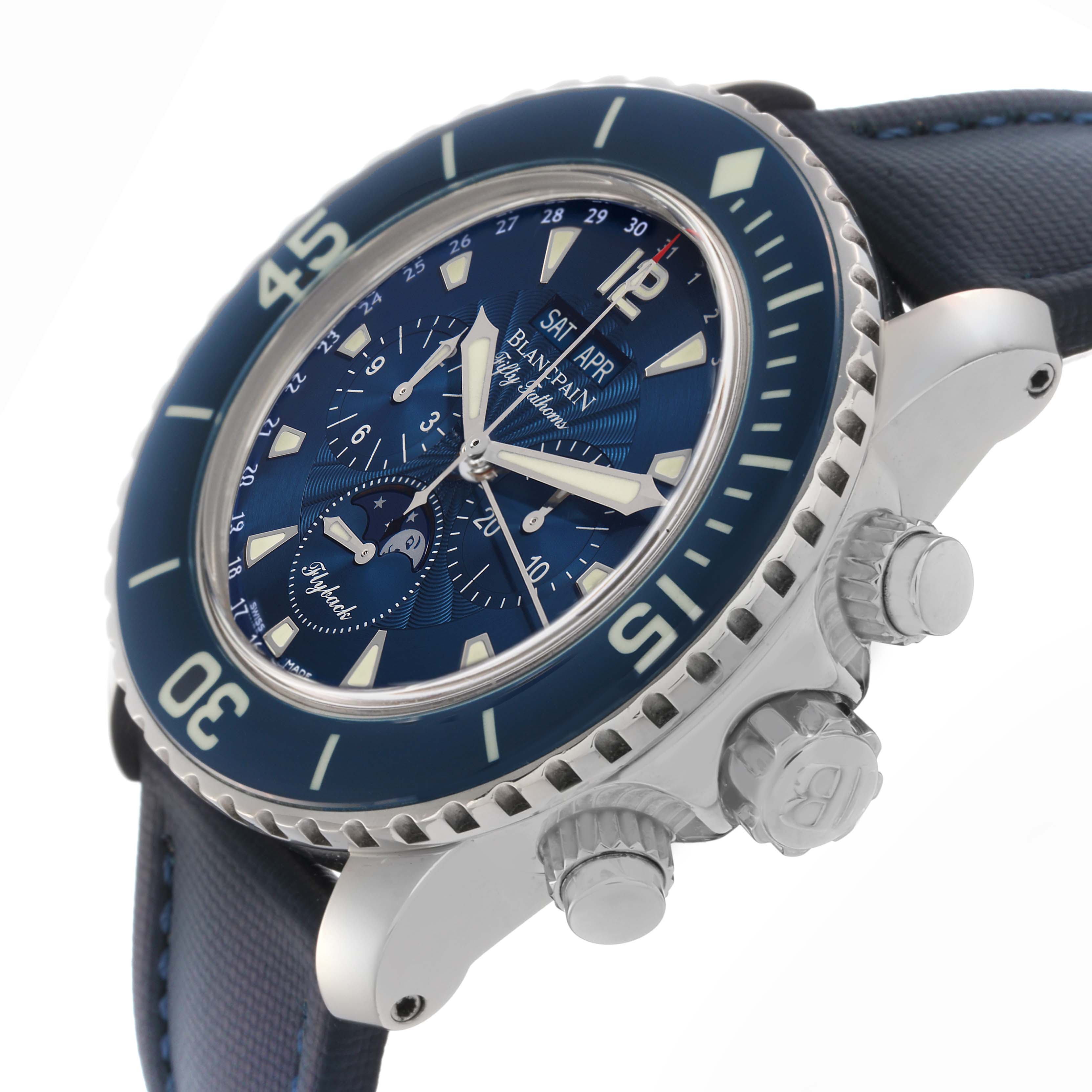 The watch is shown at an angled side view, highlighting the side case, textured crown, pushers, and the blue dial of the Blancpain Fifty Fathoms model 5066F-1140-52B.