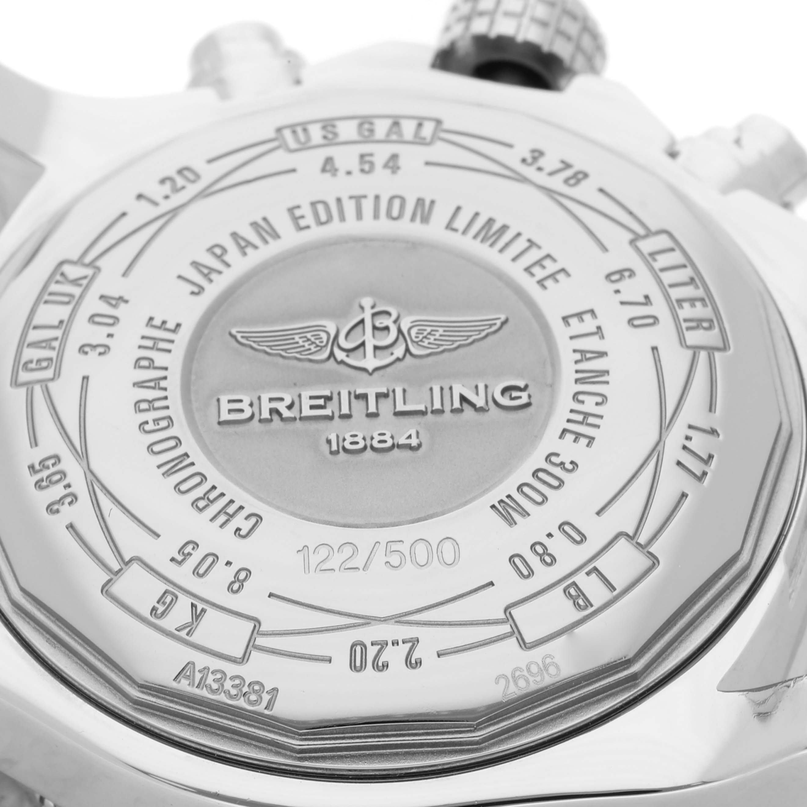 The image shows the back of the Breitling Limited Series watch, displaying model information and edition number (122/500).