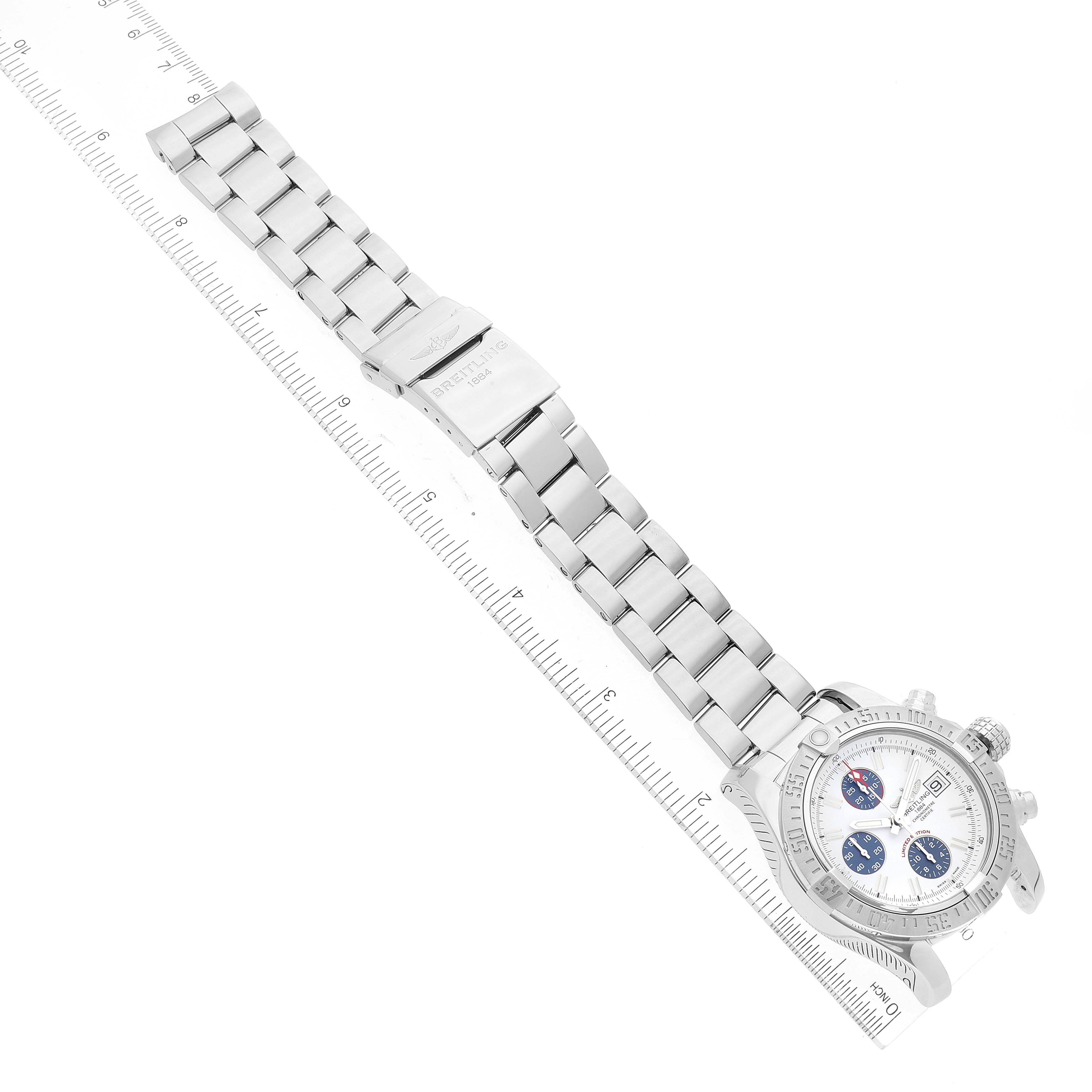 The image shows a Breitling Limited Series model watch laid flat with a ruler measuring its length.