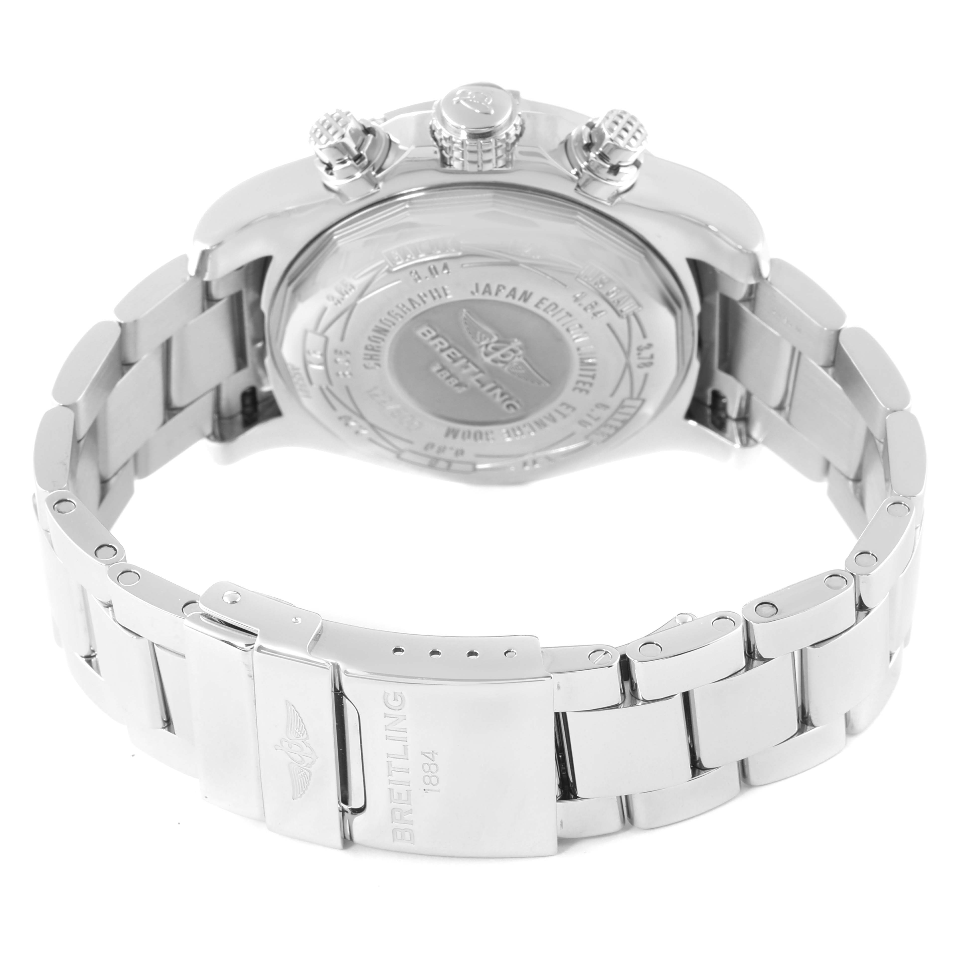 The image shows the back view of the Breitling Limited Series watch case and partially closed metal bracelet.