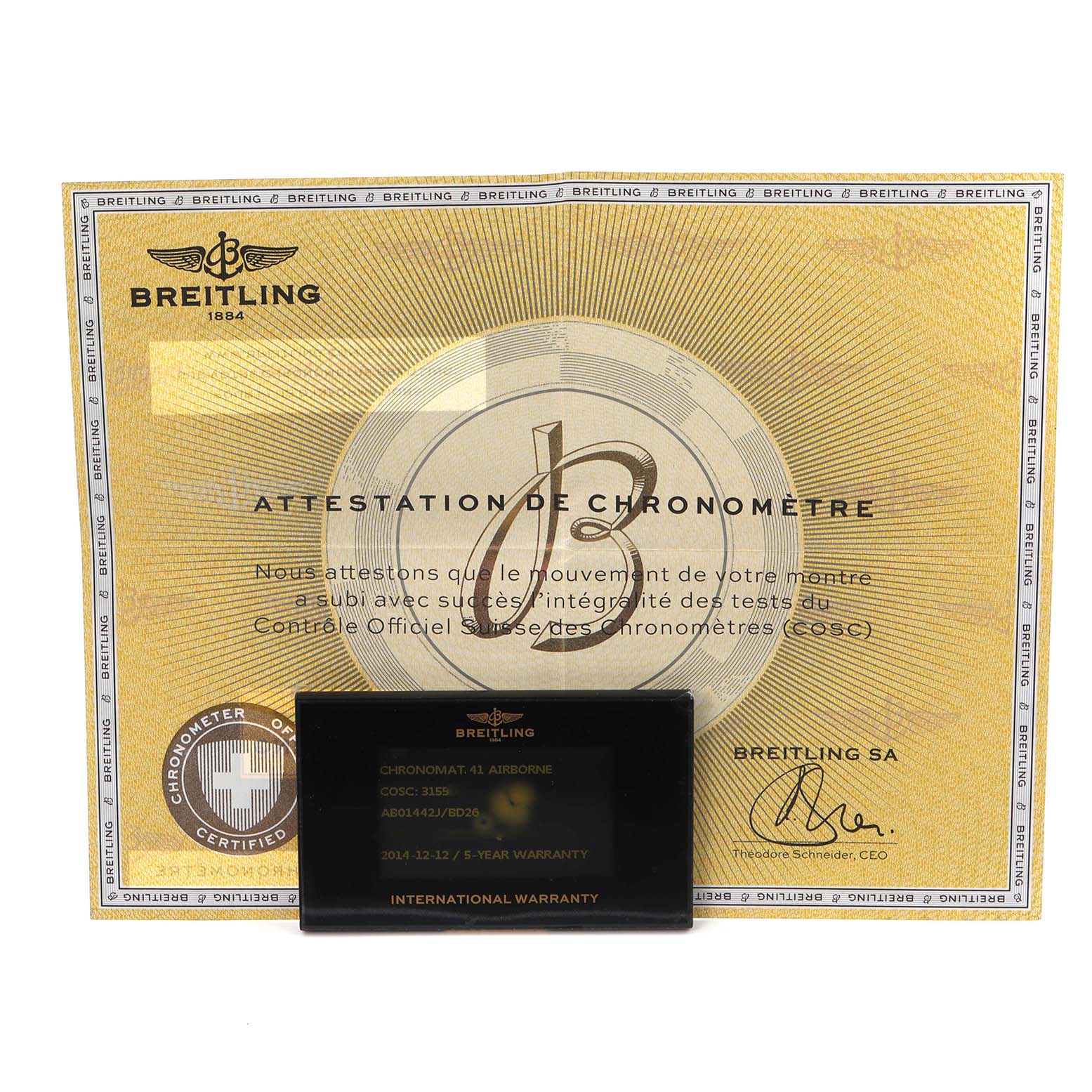The image shows the Breitling Chronomat model AB0144's certificate and international warranty card displayed from a front angle.
