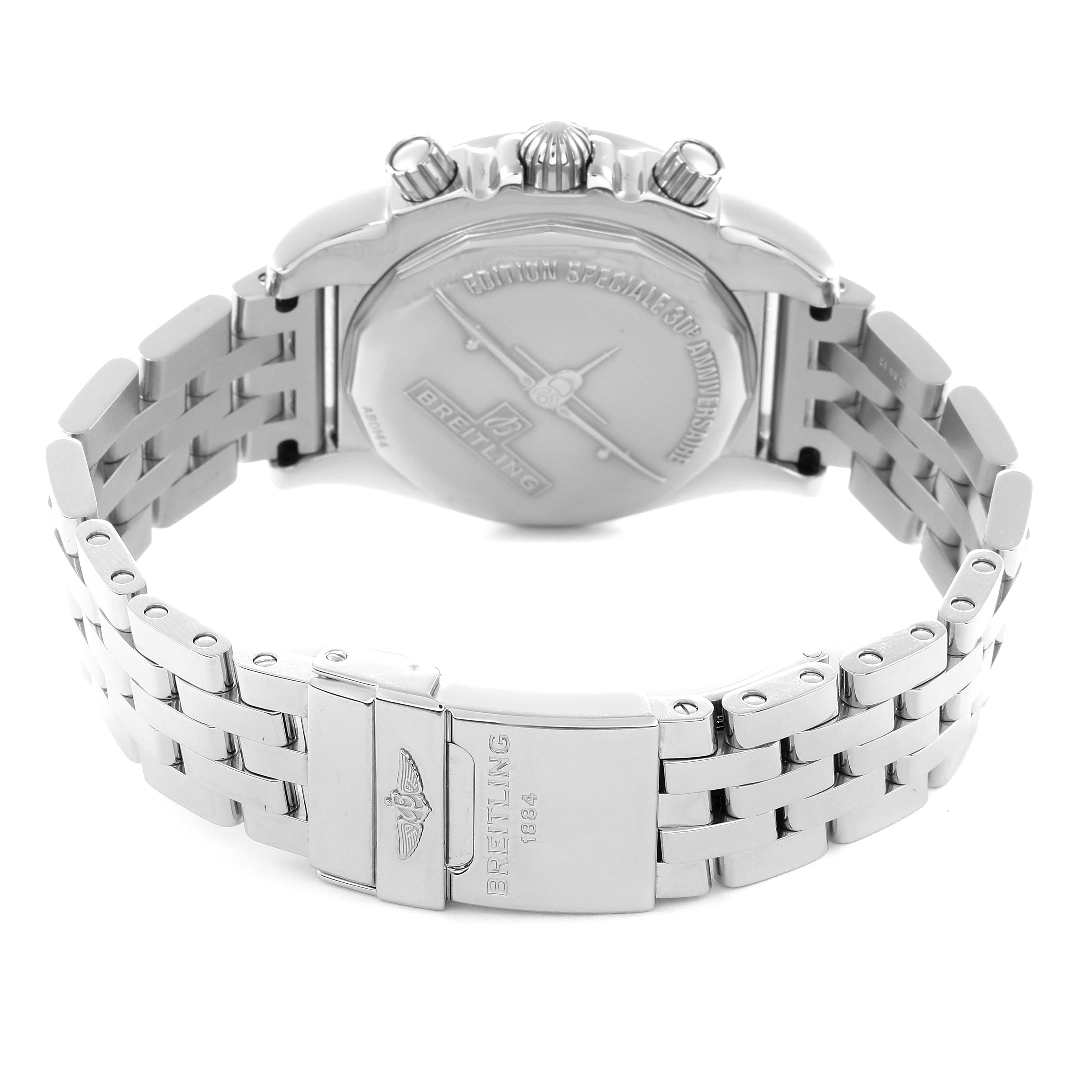 The image shows the rear view of a Breitling Chronomat AB0144 men's watch, highlighting its clasp, bracelet, and case back with engravings.