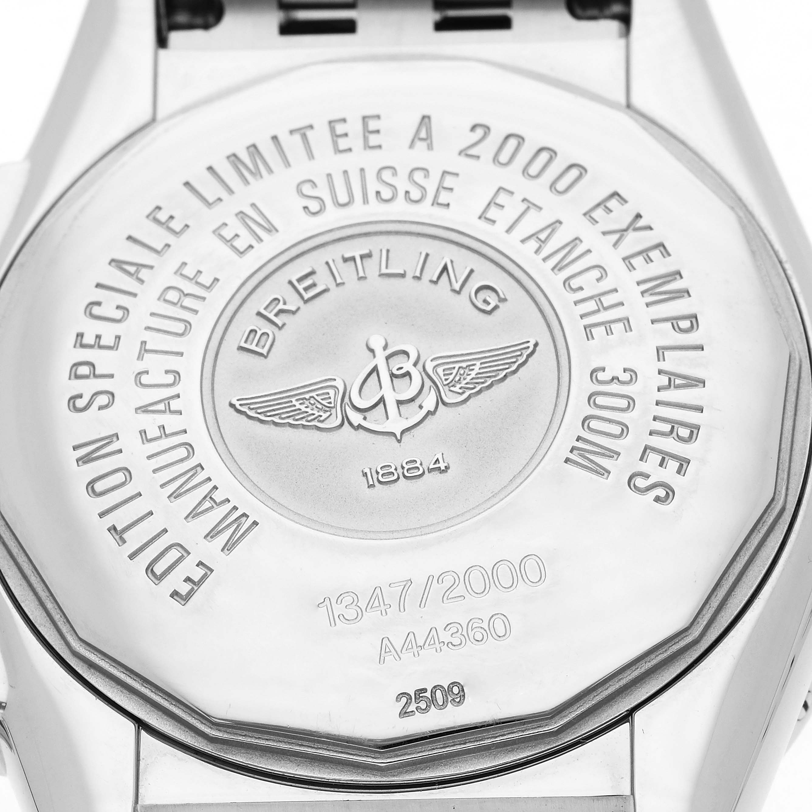 The image shows the back of a Breitling Chronomat men's watch, model A44360, highlighting its limited edition engraving and water resistance details.