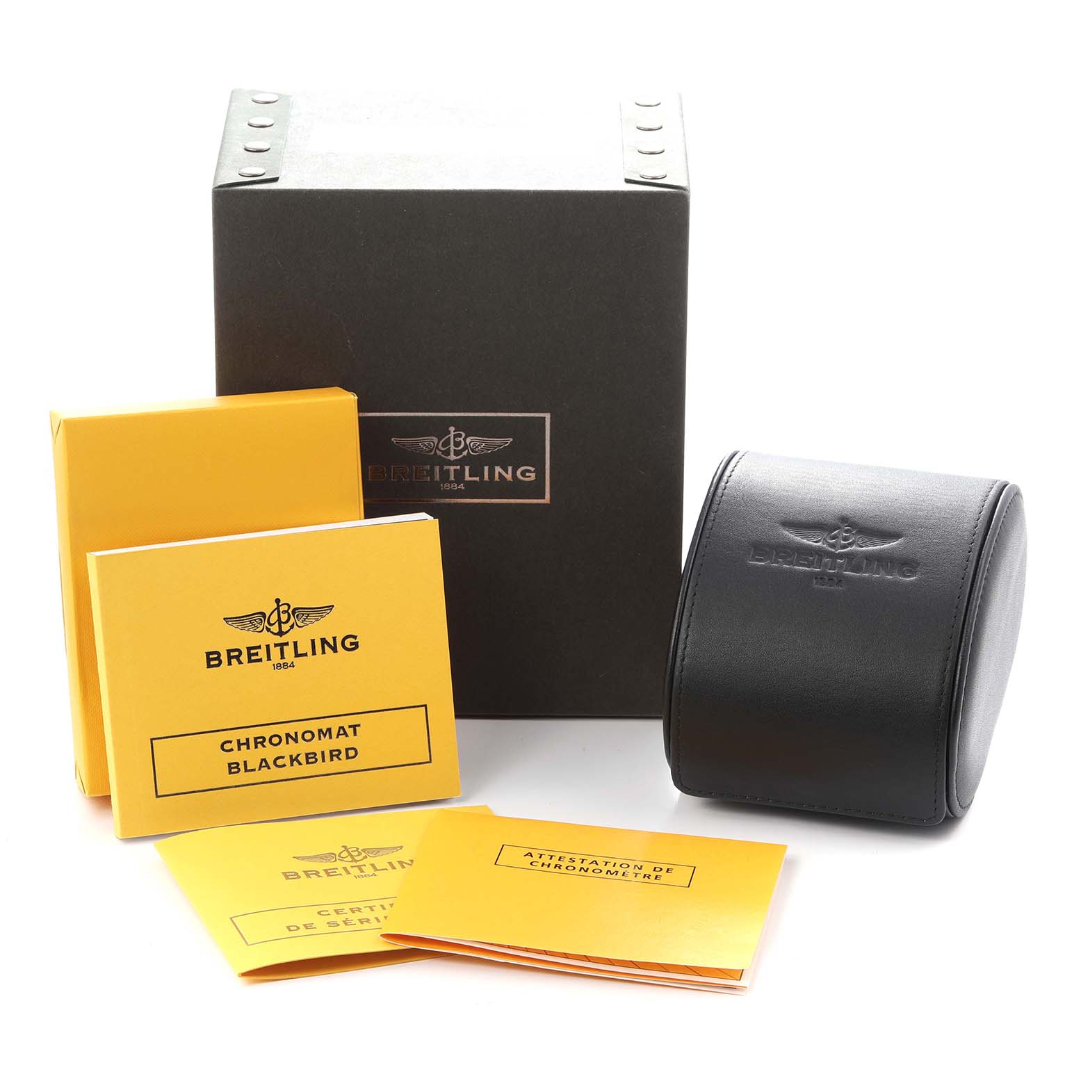 The image shows Breitling Chronomat model A44360 packaging, including a branded box, watch case, and several instruction manuals displayed from the side.