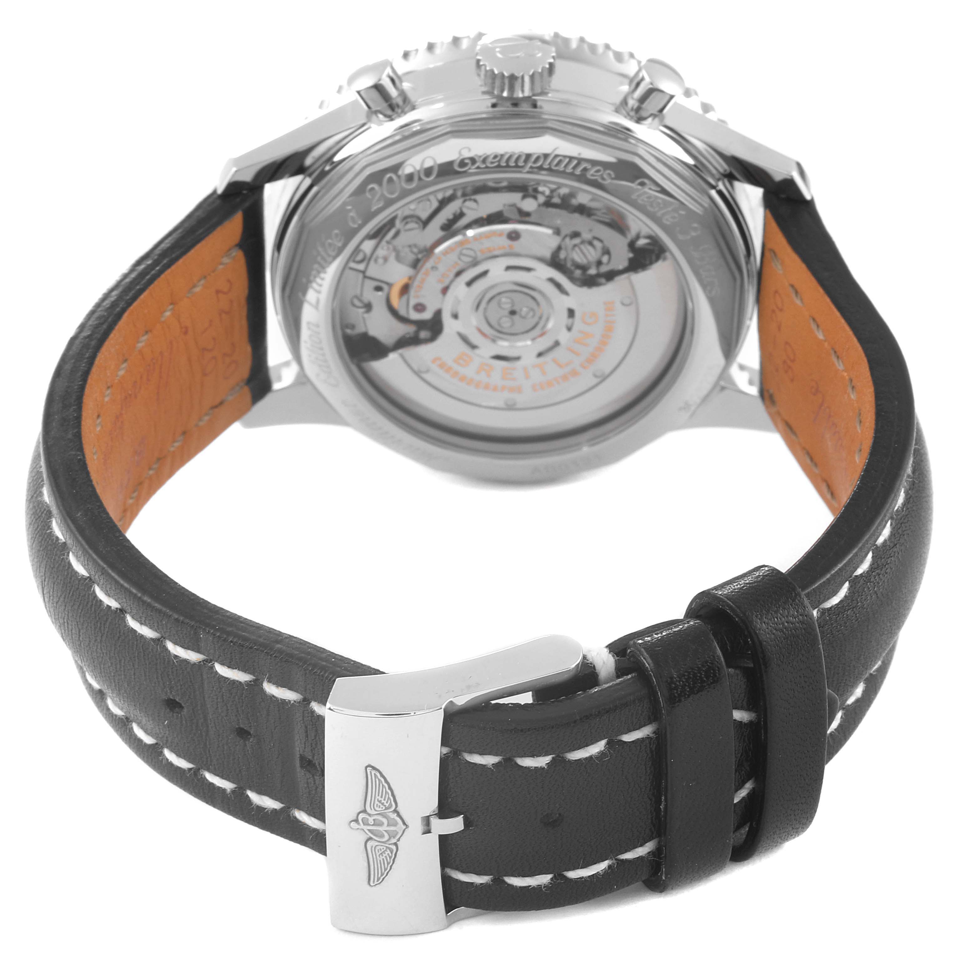 This image shows the back view of the Breitling Navitimer AB0121 Men's Stainless Steel Black Dial AB0121 Men's Stainless Steel Black Dial watch, highlighting its movement and leather strap with a clasp.
