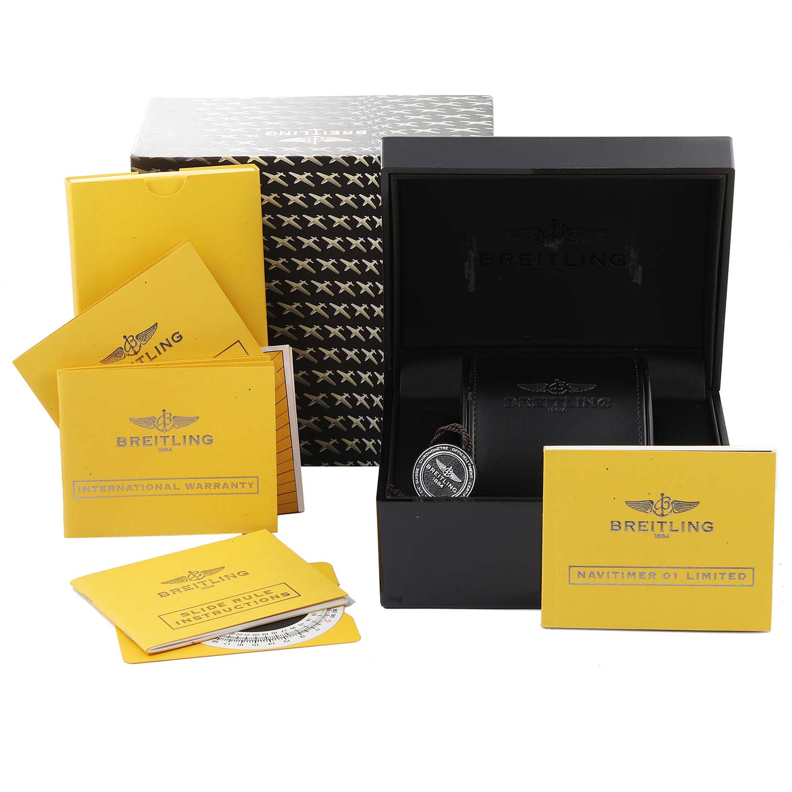 The image shows the packaging, manuals, and warranty cards for a Breitling Navitimer AB0121 Men's Stainless Steel Black Dial AB0121 Men's Stainless Steel Black Dial model, along with the watch box.