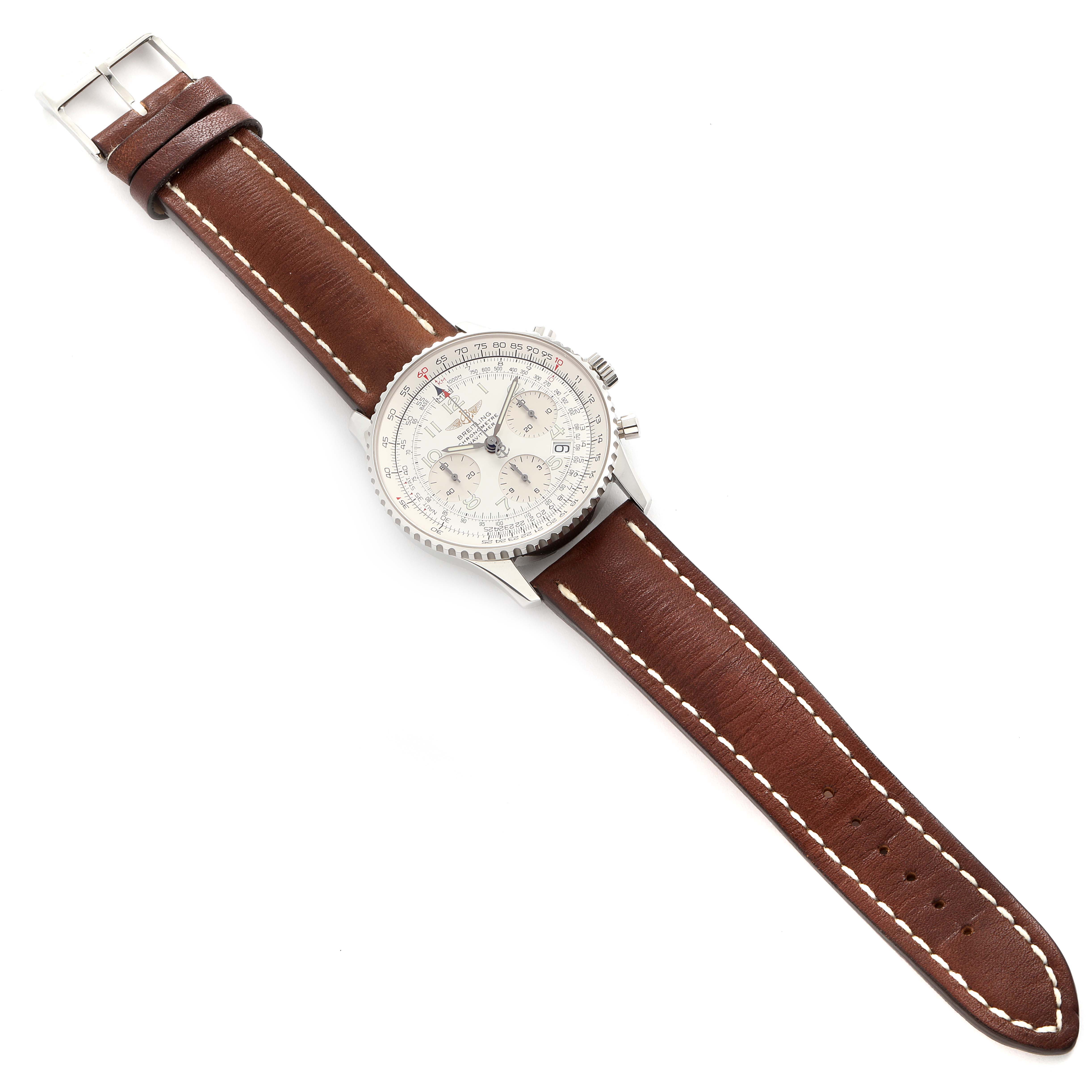 The Breitling Navitimer A23322 Men's Stainless Steel Silver Dial A23322 Men's Stainless Steel Silver Dial watch with a brown leather strap is shown from a top-down angle, displaying the dial and bezel.