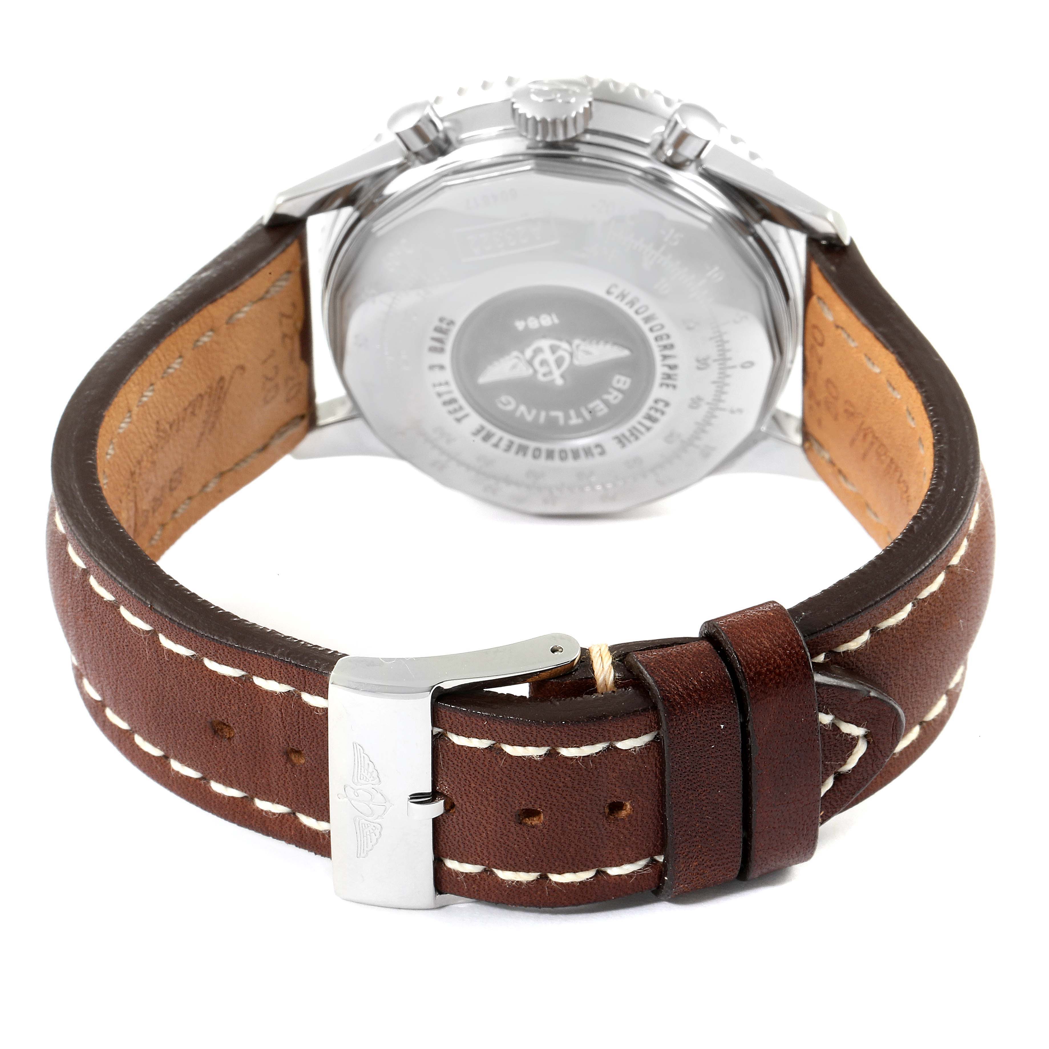 The image shows the back view of a Breitling Navitimer A23322 Men's Stainless Steel Silver Dial A23322 Men's Stainless Steel Silver Dial watch, focusing on the case back and brown leather strap.