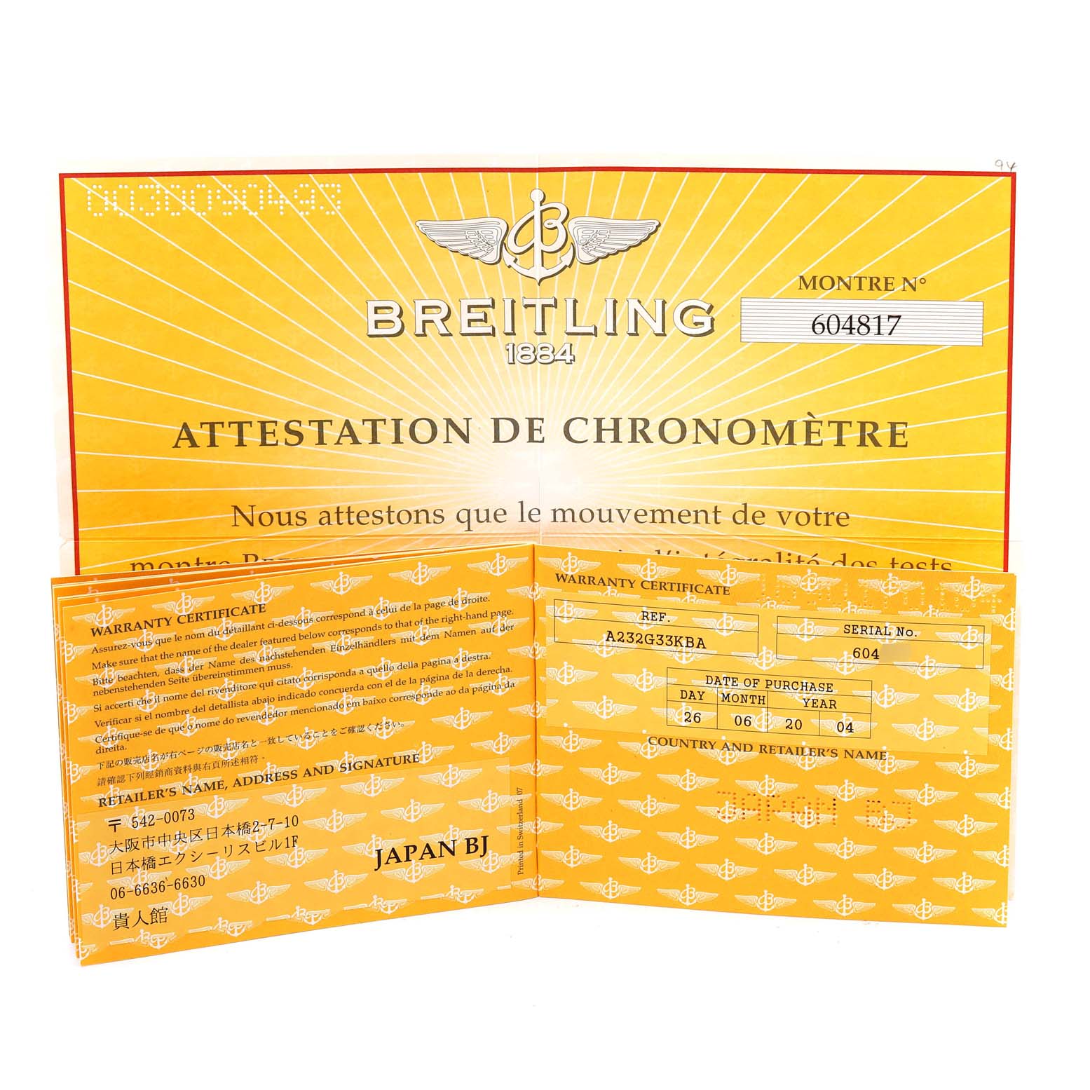 The image shows the warranty certificate and attestation de chronomètre documentation for a Navitimer model by Breitling.