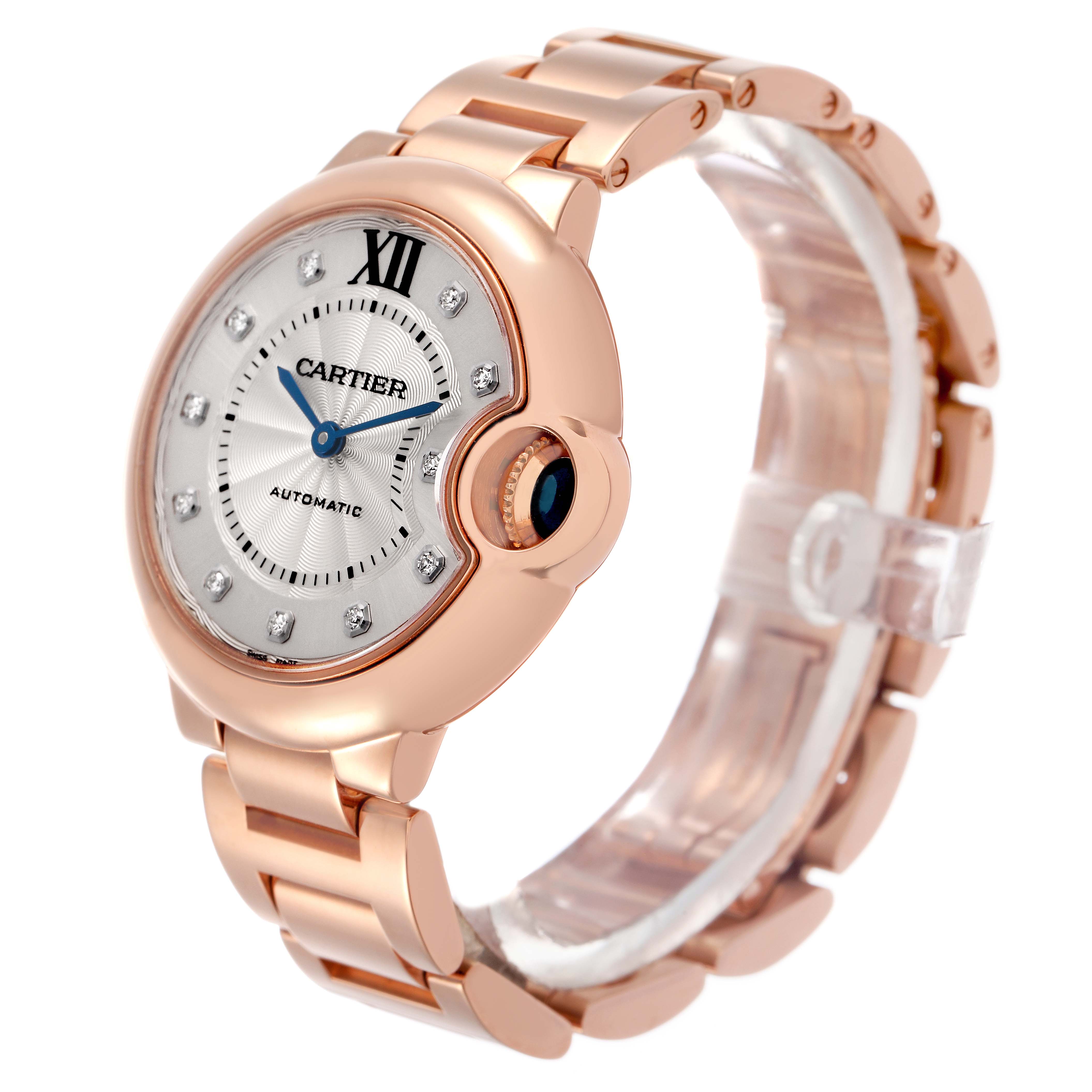 The image shows a Cartier Ballon Bleu WE902034 Women's Rose Gold Silver Dial watch at an angle highlighting the face, bracelet, and crown.