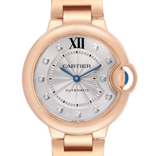 The Cartier Ballon Bleu WE902034 Women's Rose Gold Silver Dial watch is shown from the front, highlighting its face, crown, and upper bracelet.