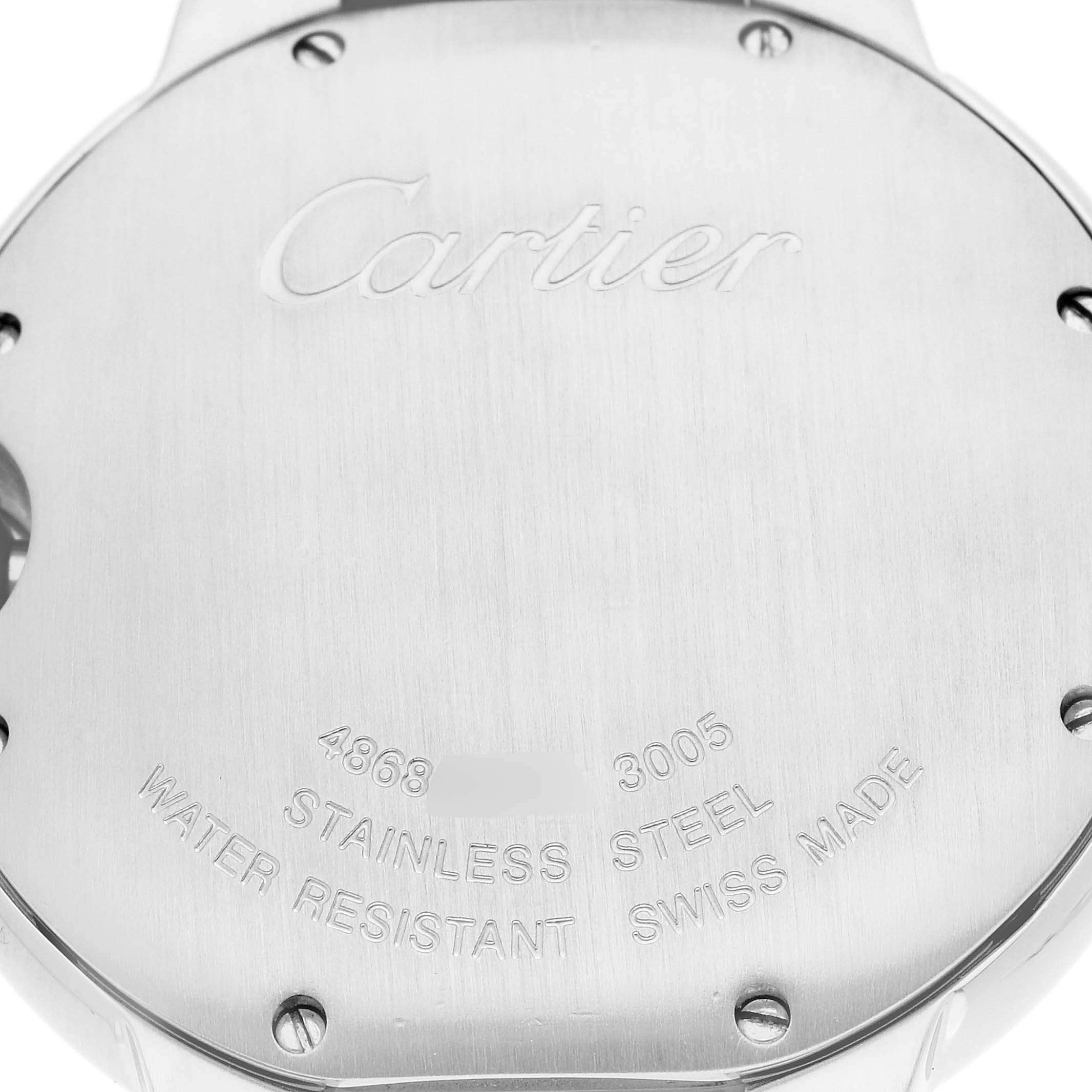 The image shows the back case of a Cartier Ballon Bleu men's watch, model number W69008Z3, displaying engravings such as "Cartier," "Stainless Steel," and "Swiss Made."