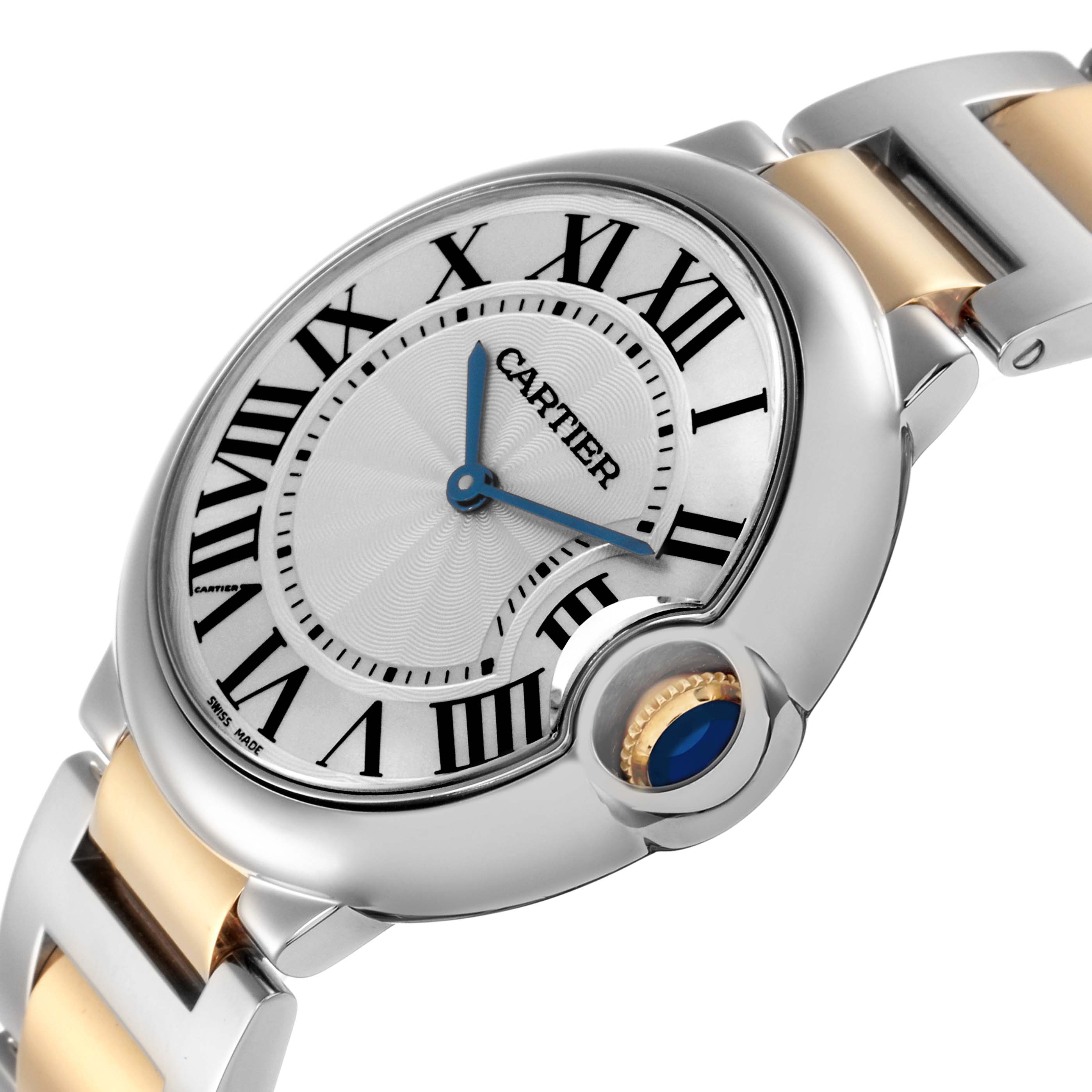 The Cartier Ballon Bleu model W69008Z3 men's watch is shown at an angled view, highlighting its rounded case, Roman numeral dial, blue hands, and crown with a blue cabochon.