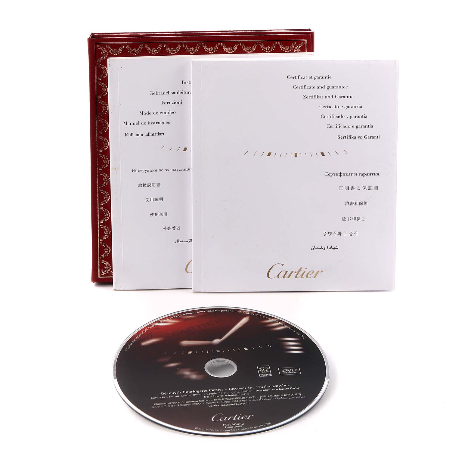 The image shows the Cartier Ballon Bleu model W69008Z3's watch accessories, including a manual, warranty certificate, and a DVD, from a frontal angle.