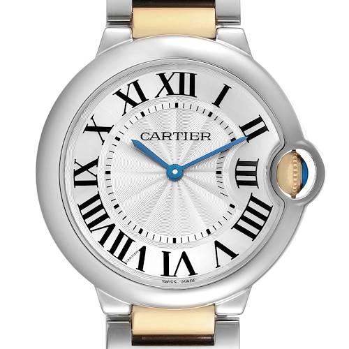 The Cartier Ballon Bleu W69008Z3 Men's Steel and Gold (two tone) Silver Dial watch is shown from a front angle, highlighting its round case, Roman numerals, and blue hands.