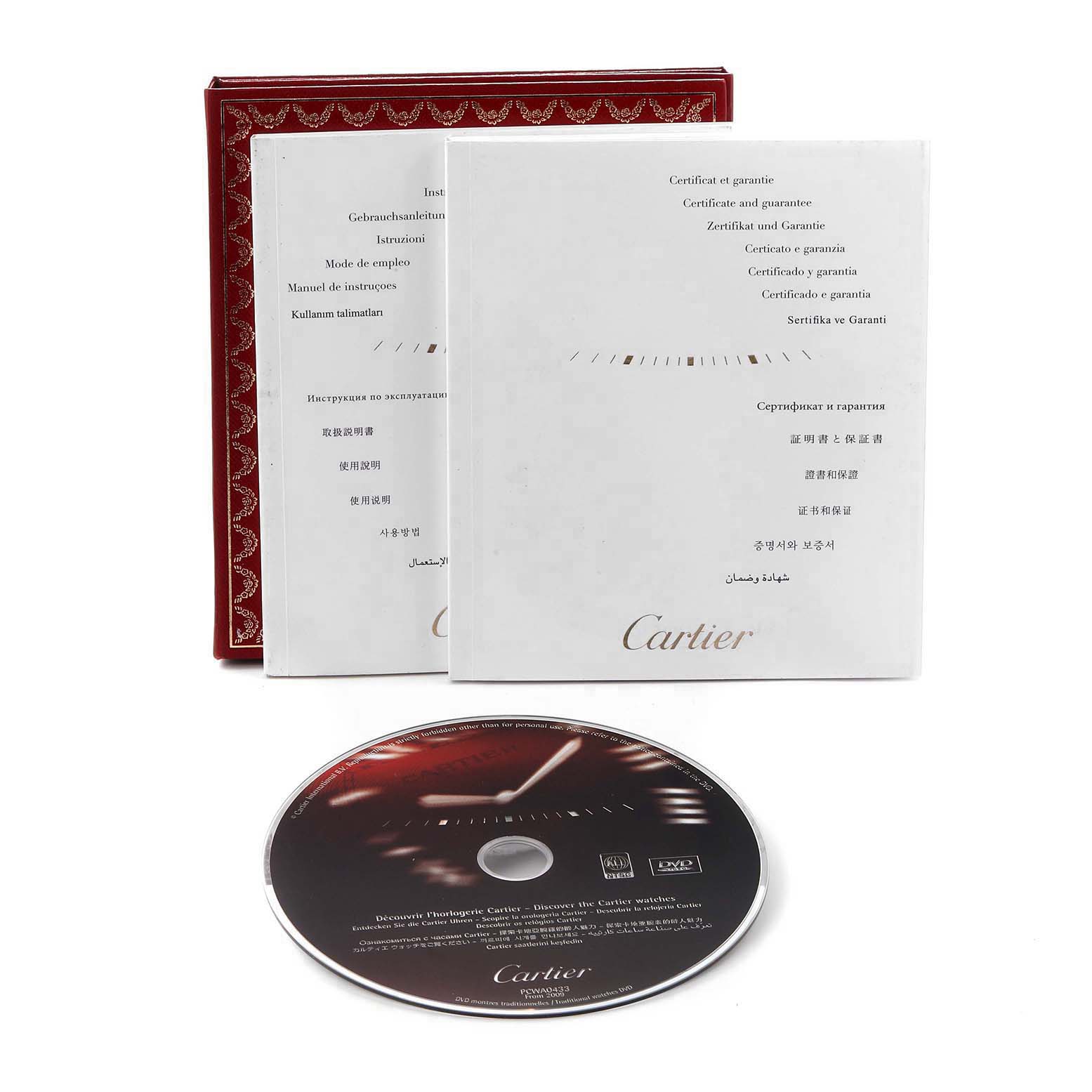 The image shows instruction manuals and a CD for the Cartier Ballon Bleu W69008Z3 Men's Steel and Gold (two tone) Silver Dial watch, displayed at an angle with a red box.