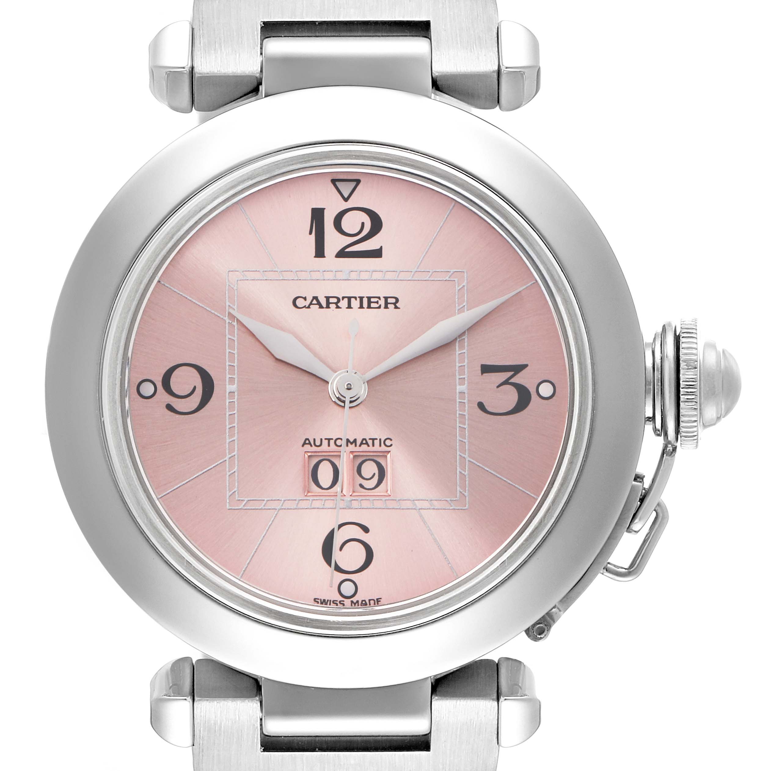 The Cartier Pasha W31058M7 men's watch is shown from a front angle detailing the round case, pink dial, crown guard, and stainless steel bracelet attachments.