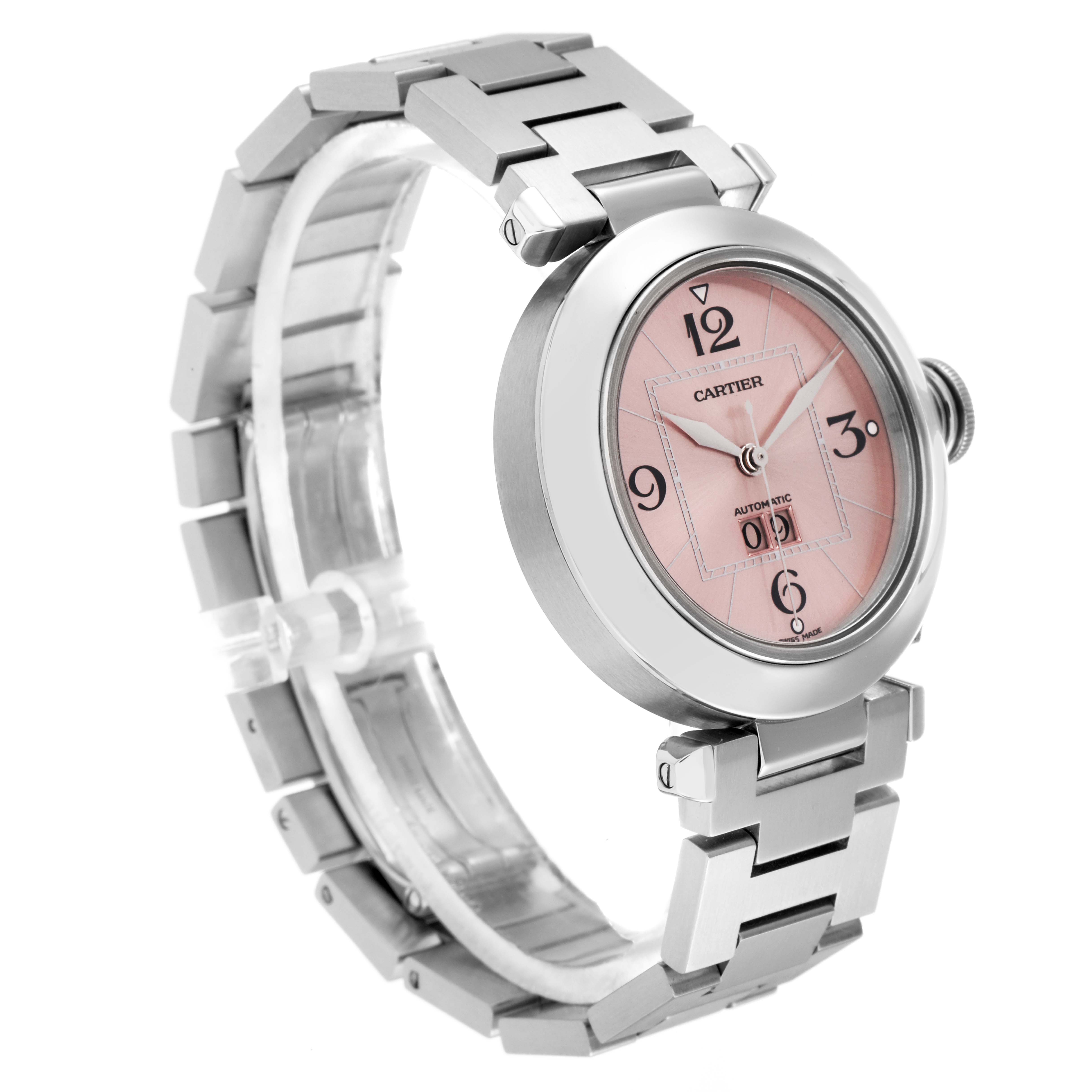 The Cartier Pasha W31058M7 men's watch is shown from a three-quarter angle, highlighting its pink dial, stainless steel case, and bracelet.