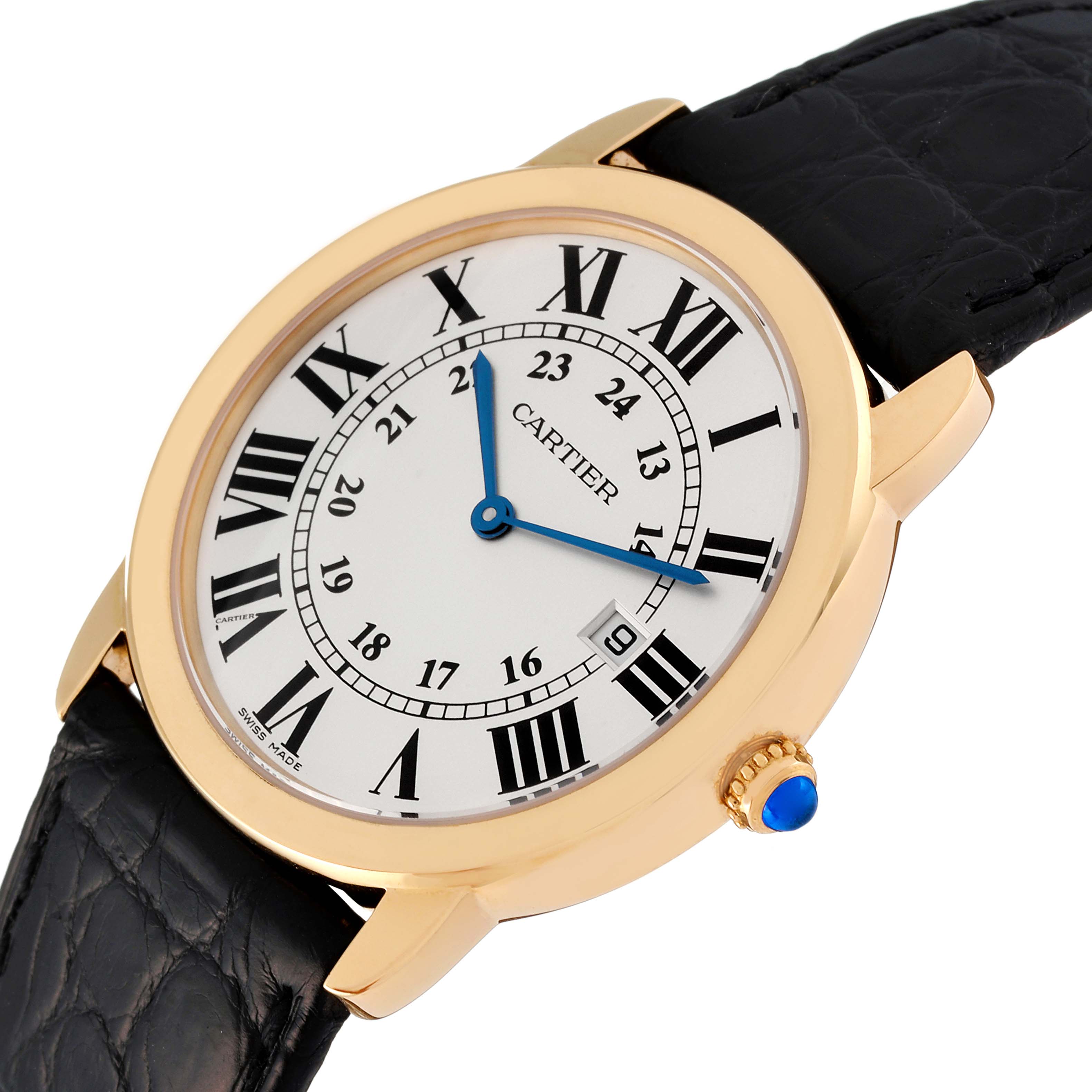 The Ronde model by Cartier is shown at an oblique angle, highlighting its face, Roman numerals, and blue cabochon crown.
