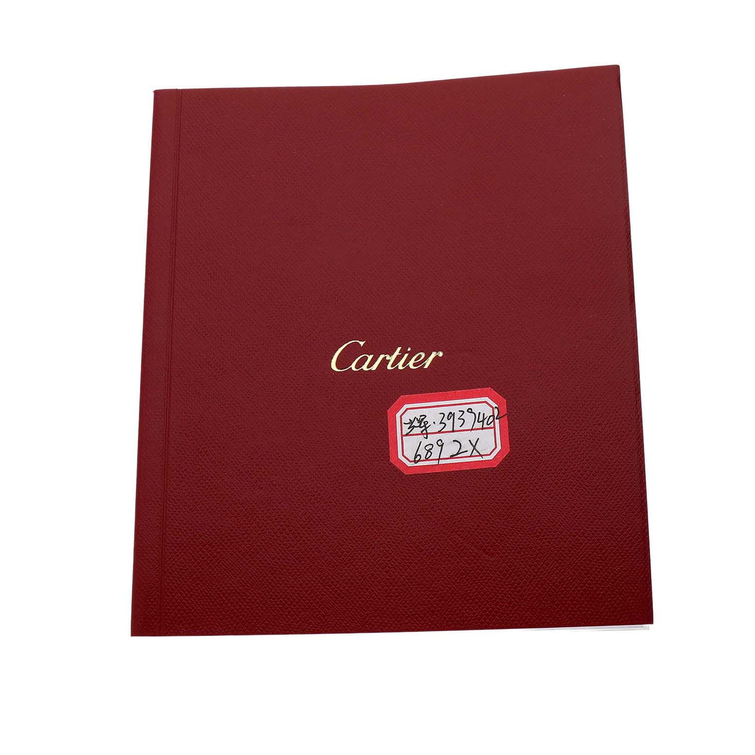 The image shows a Cartier booklet related to the Ronde model, featuring the brand name on its cover.