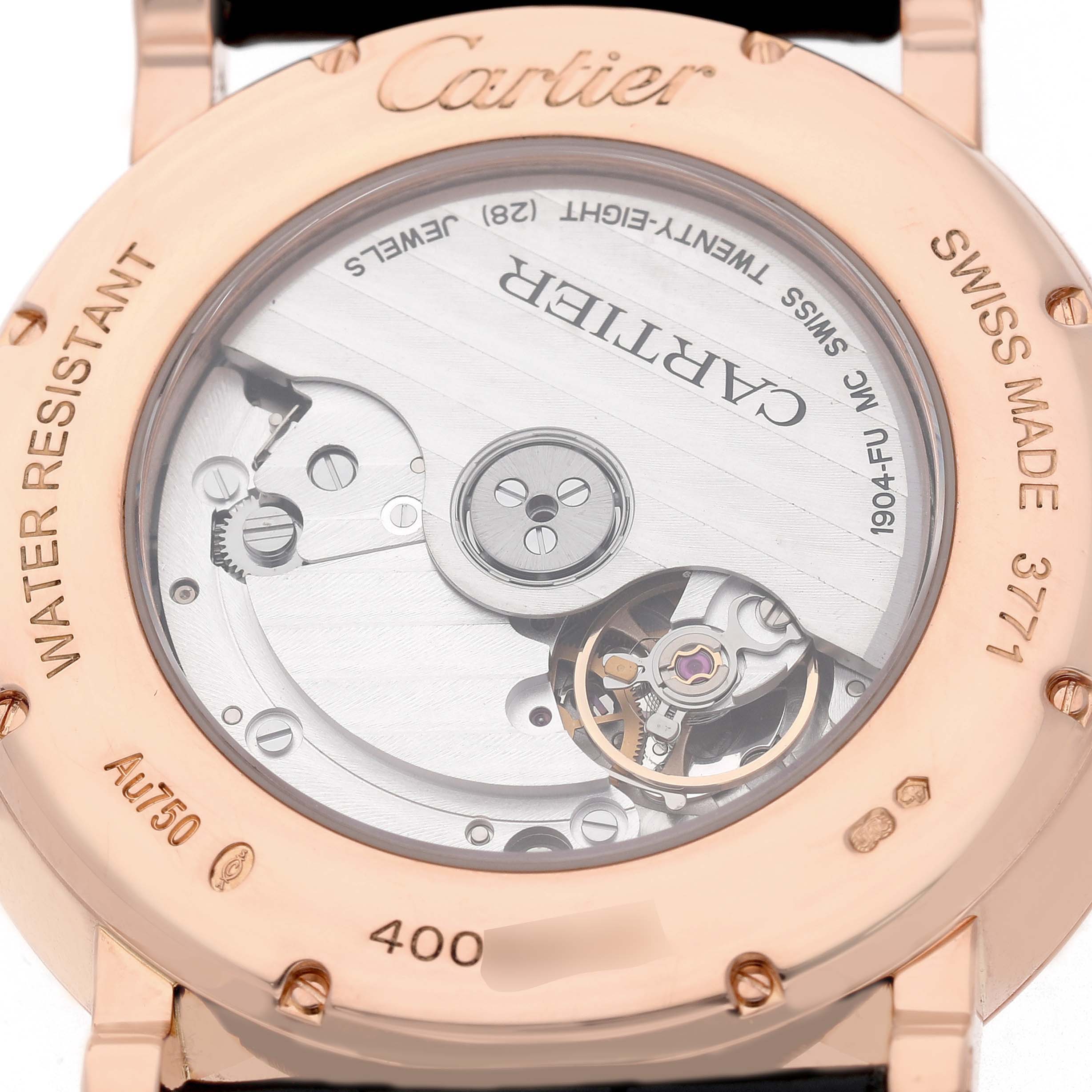 The image shows the back view of a Cartier Rotonde W1556240 Men's Rose Gold Silver Dial watch, highlighting its movement and engravings.