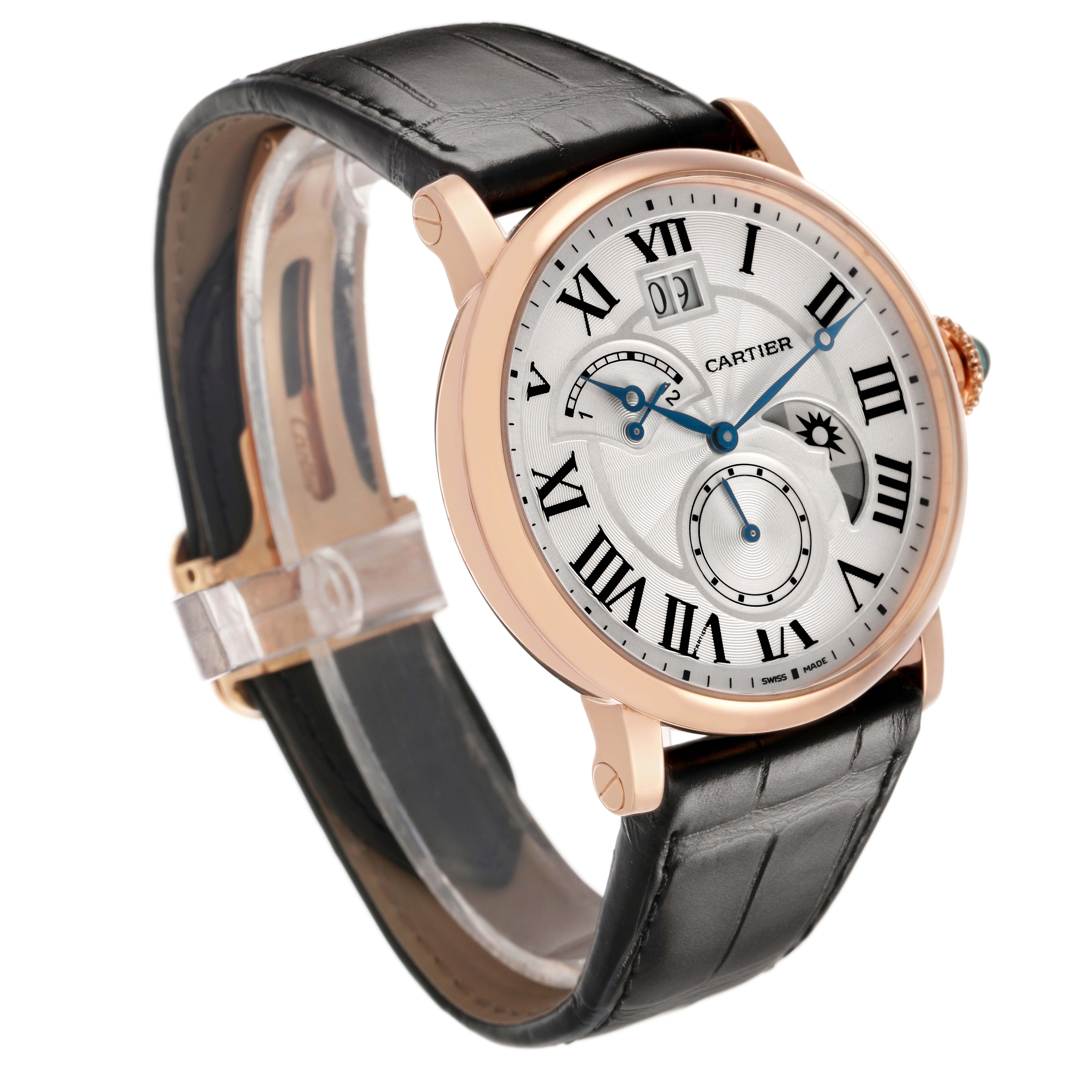 The Cartier Rotonde W1556240 Men's Rose Gold Silver Dial watch is shown at an angle displaying the face, Roman numerals, date window, and leather strap.