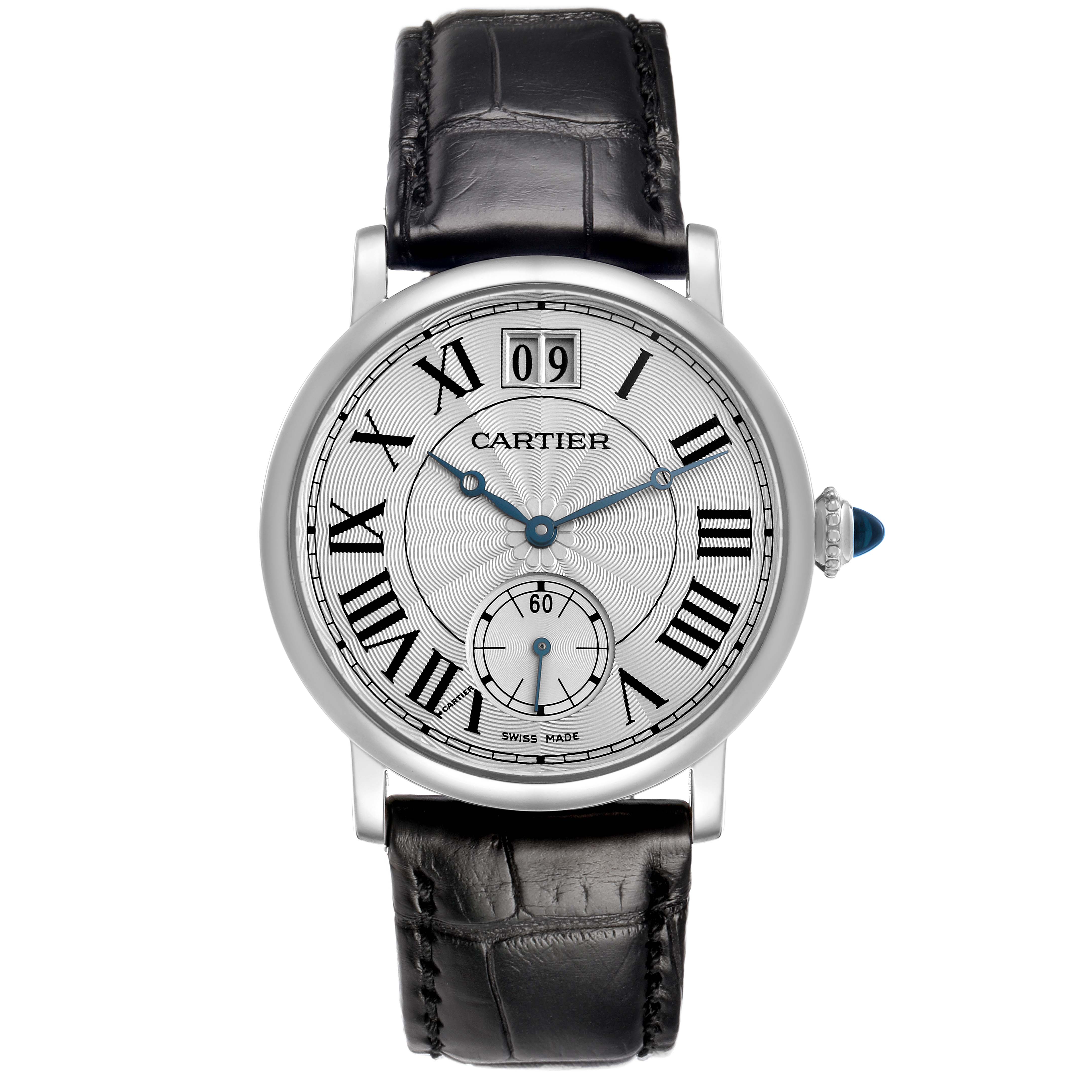 The Cartier Rotonde W1552851 Men's White Gold Silver Dial watch is shown from a top-down angle, displaying its face, Roman numerals, blue hands, date window, and black strap.