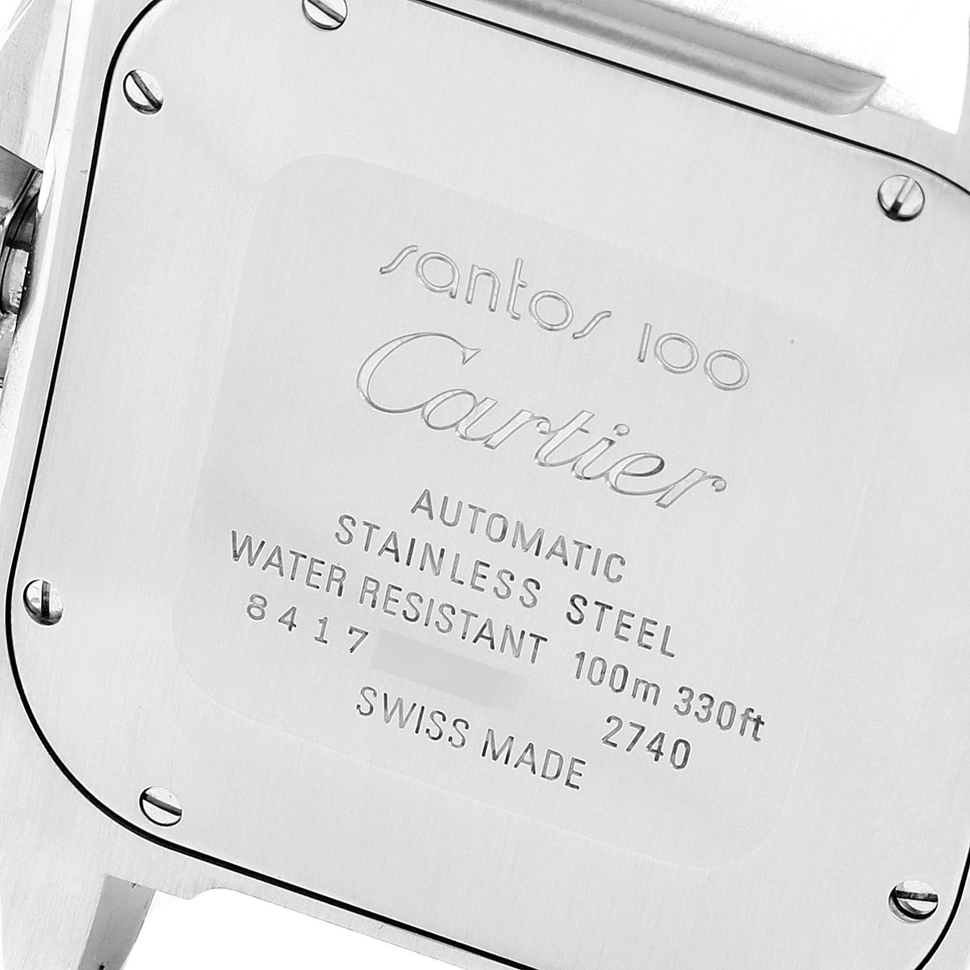 The image shows the back case of a Santos model by Cartier, highlighting its specifications and branding.